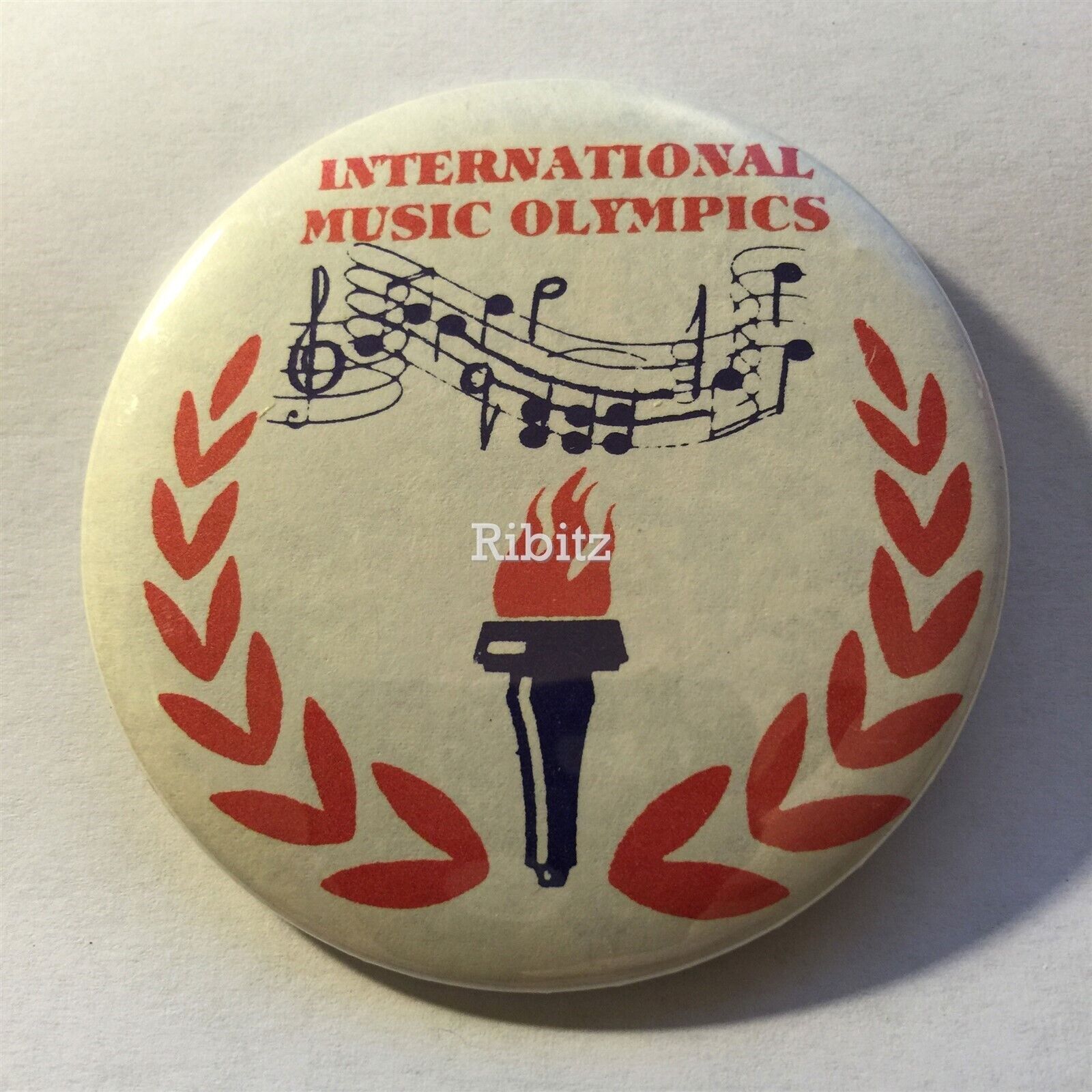 IMO International Music Olympics button badge pin - back oxidation