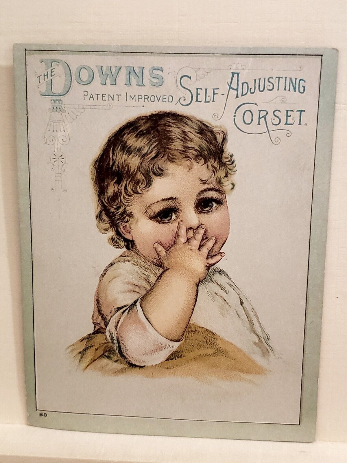 The Downs Self Adjusting Corset Infant Girl Victorian Trade Card Advertisement