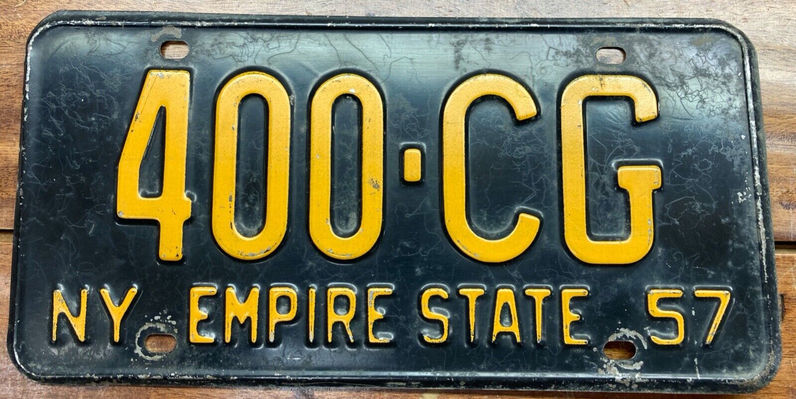 FAIRLY NICE LOOKING ALL ORIGINAL 1957 NEW YOUR LICENSE PLATE, 400 CG