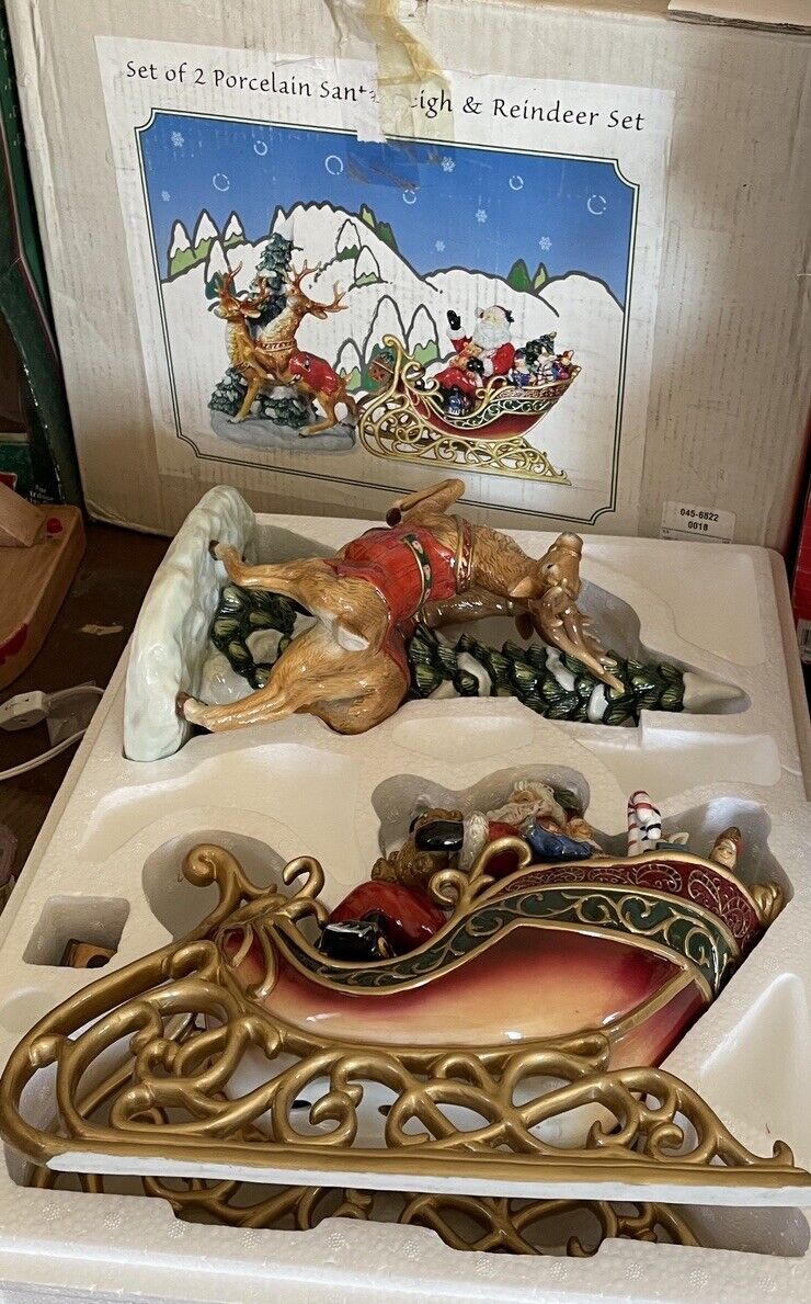 Set Of 2 Porcelain Santa Sleigh and Reindeer