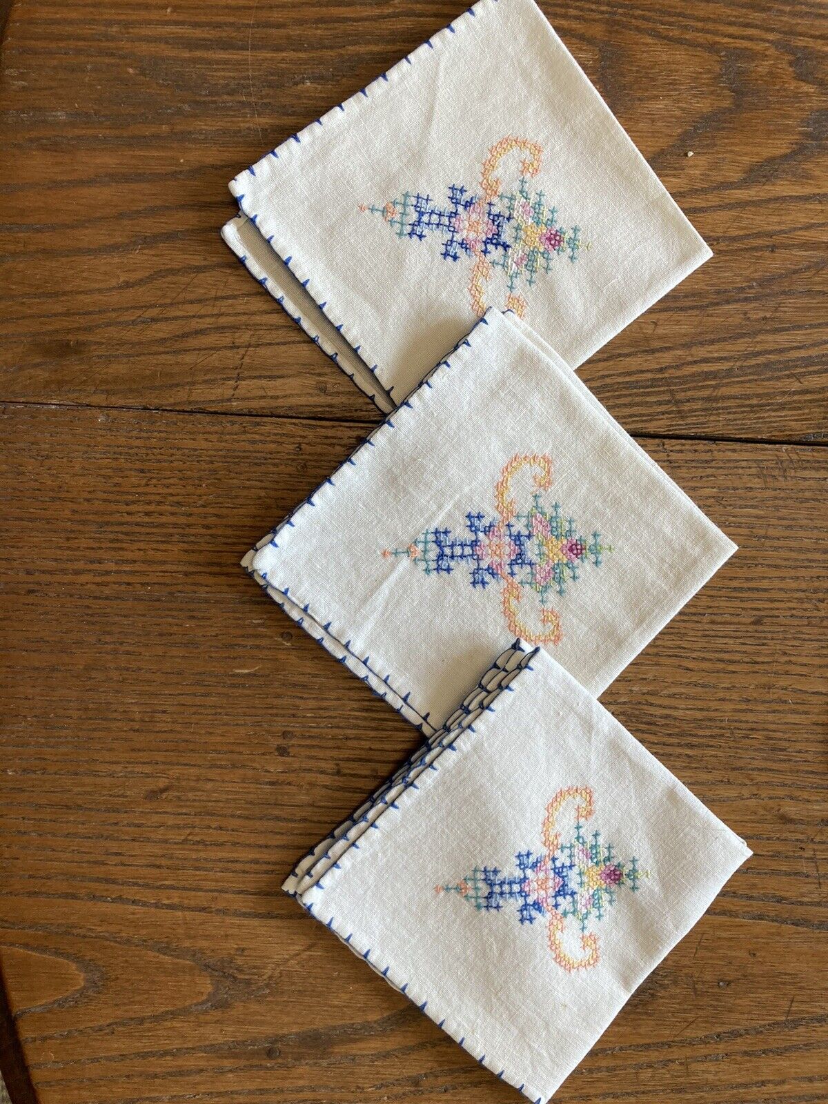 Set of 3 vintage  napkins--cross stitched handiwork