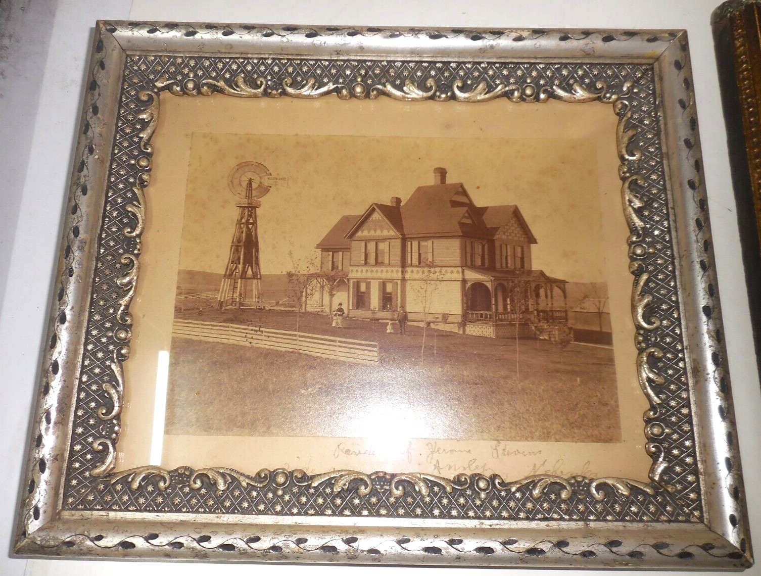 Victorian farm House in Ansly Nebraska photo Framed  with Windmill