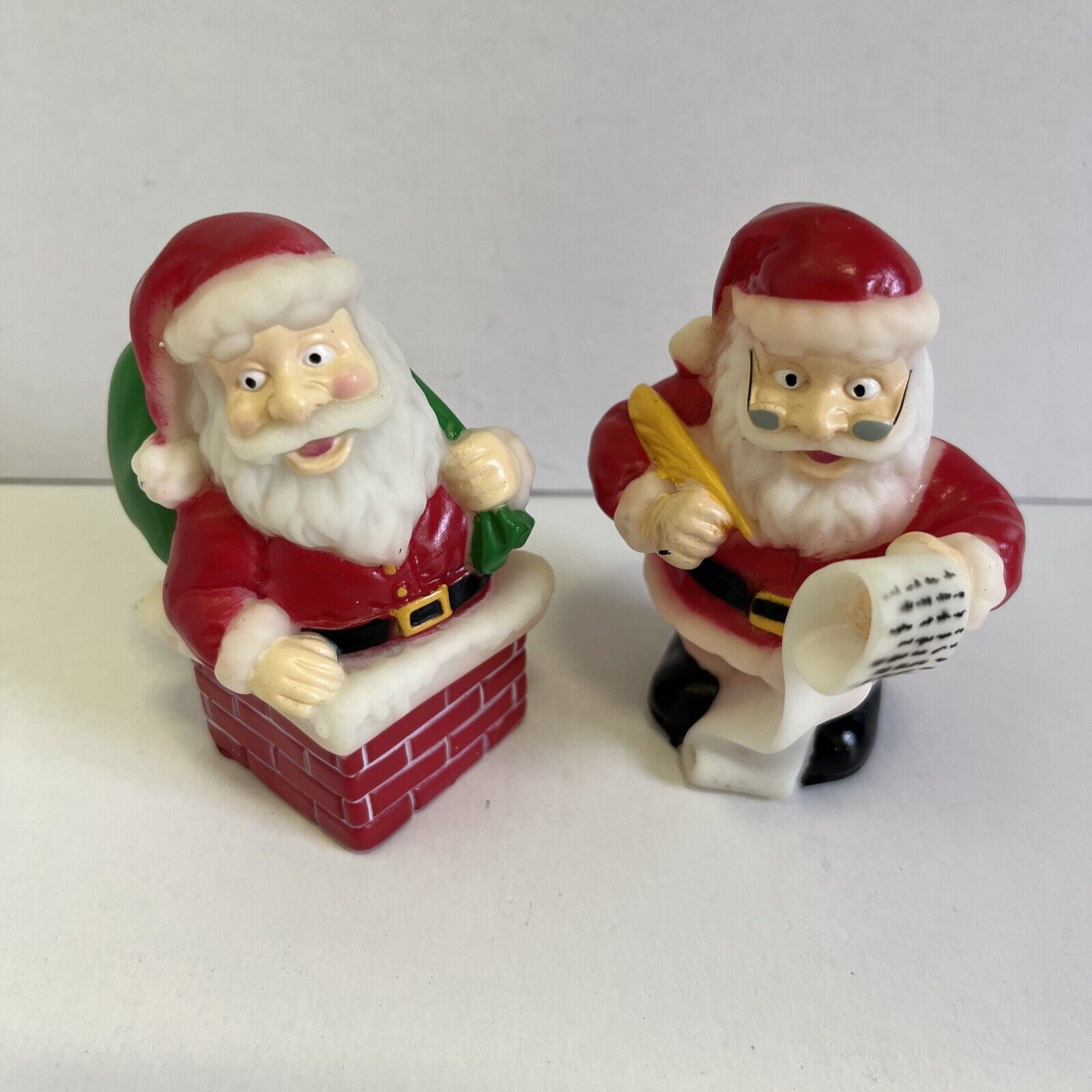 2 Vintage  1997 Rubber Santa’s