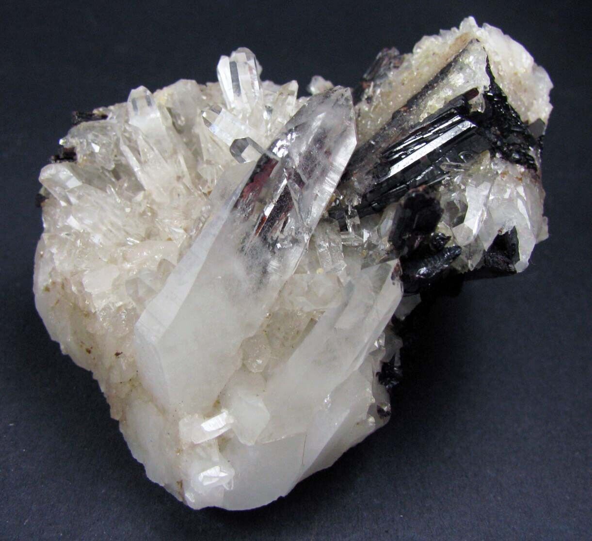 HUEBNERITE RED TRANSLUCENCY CRYSTALS in & on CLEAR QUARTZ CRYSTALS from PERÚ.