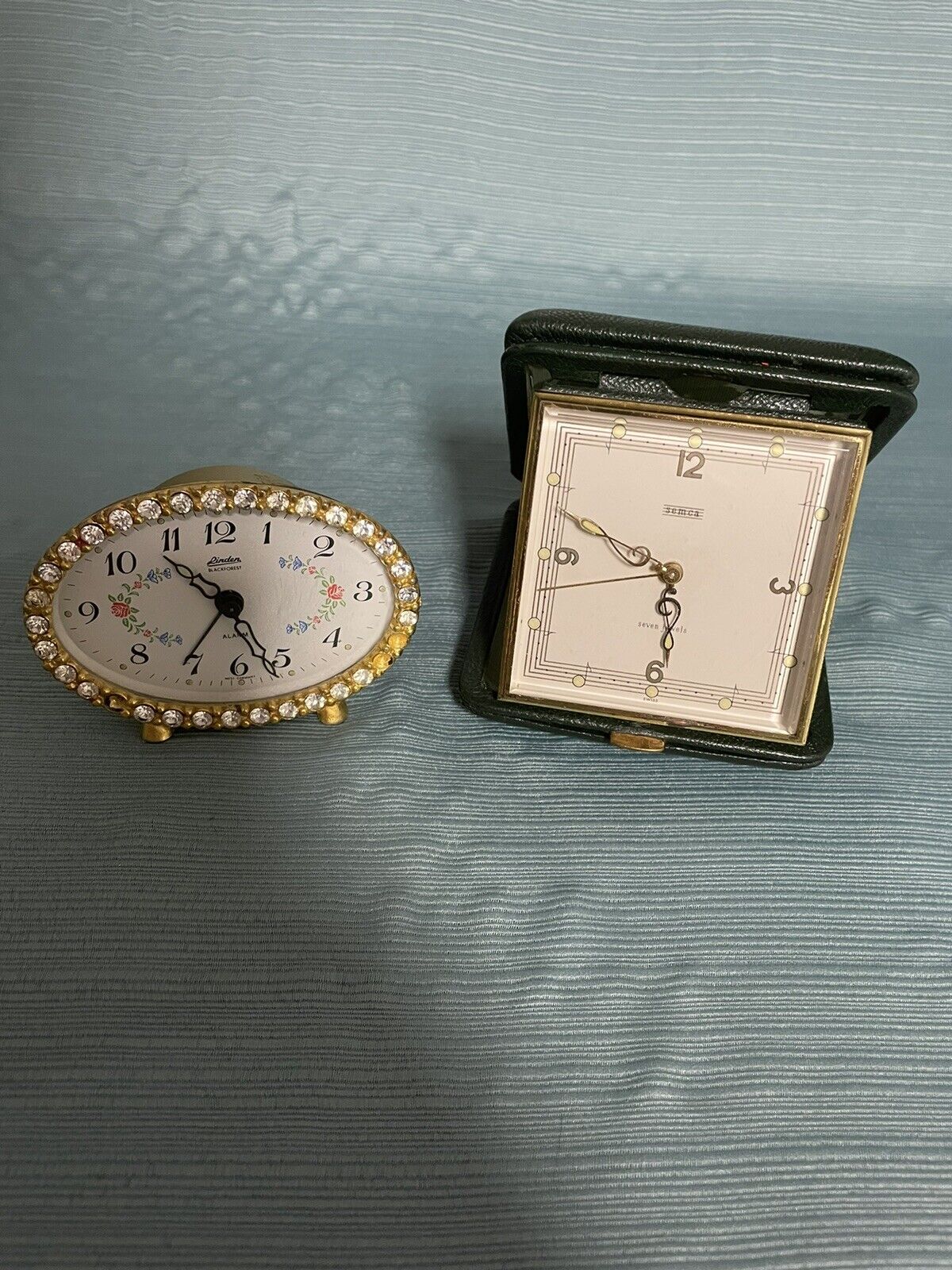 Lot of 2 Vintage Travel Alarm Clocks- Semca 7 Jewels Swiss - Linden Black Forest