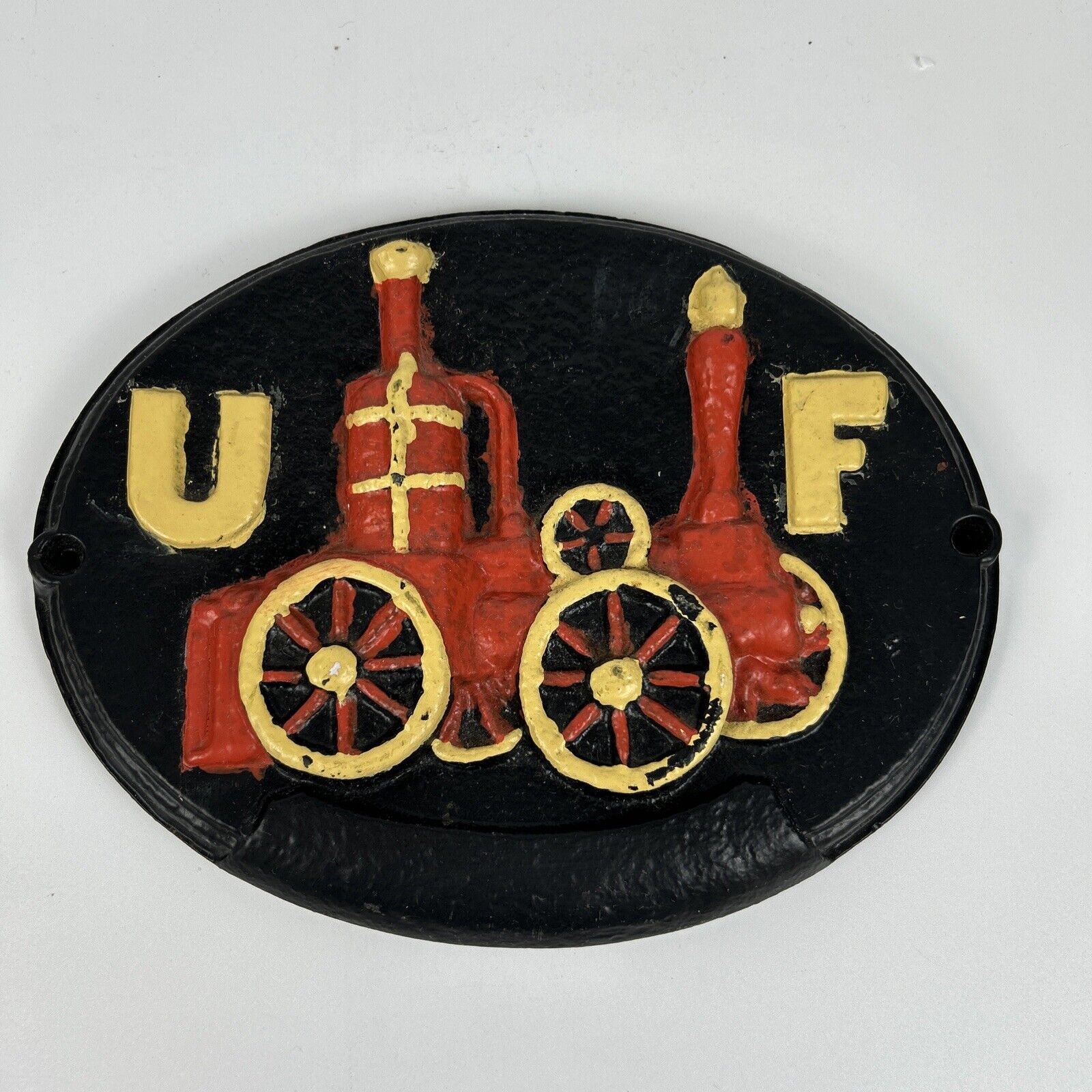 Vintage Oval Cast Iron UF UNITED FIREFIGHTER INSURANCE 3D PLAQUE SIGN 11.25”