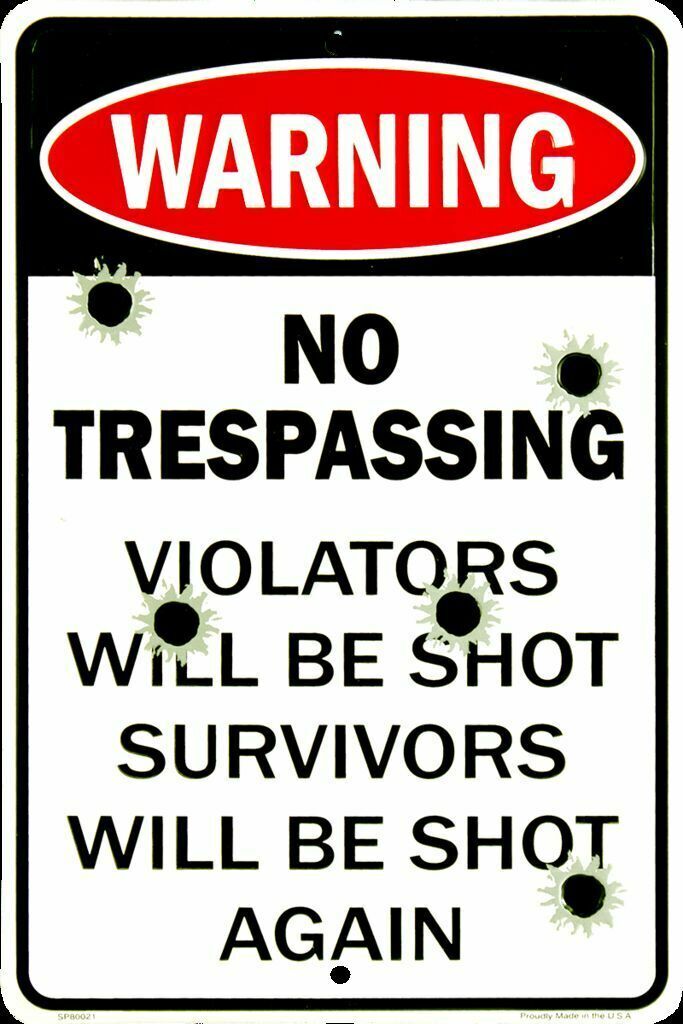 WARNING NO TRESPASSING VIOLATORS WILL BE SHOT SURVIVORS WILL BE SHOT AGAIN SIGN