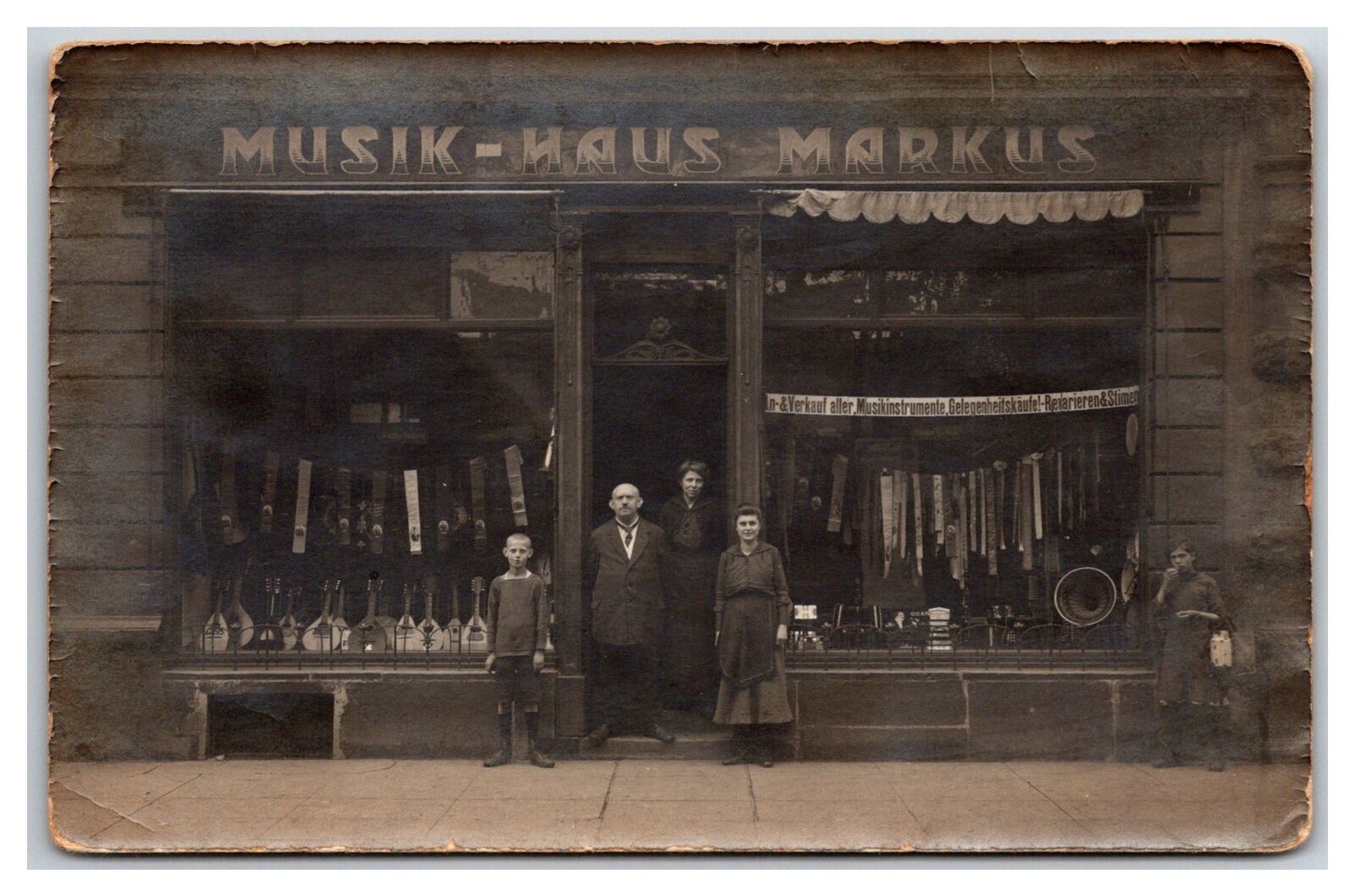 MANNHEIM GERMANY RPPC ~ Musical instrument store front w Family Markus Musik