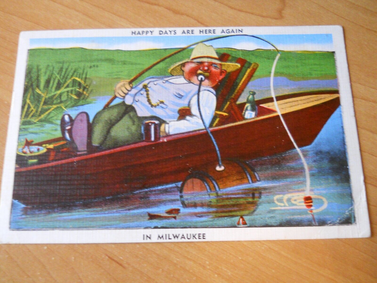 VINTAGE 1945 POSTCARD HAPPY DAYS MILWAUKEE DRINKING FISHERMAN IN BOAT FREE STAMP