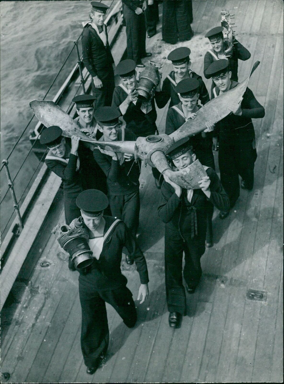 Members of the crew of H.M.A.S. Australia carry... - Vintage Photograph 4933925