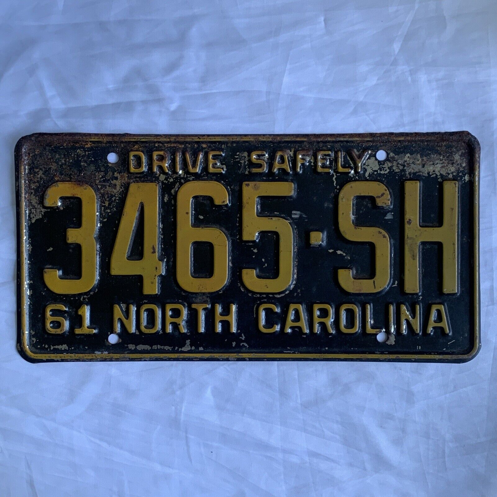 1961 NC North Carolina Drive Safely License Plate Tag 3465-SH Yellow Black