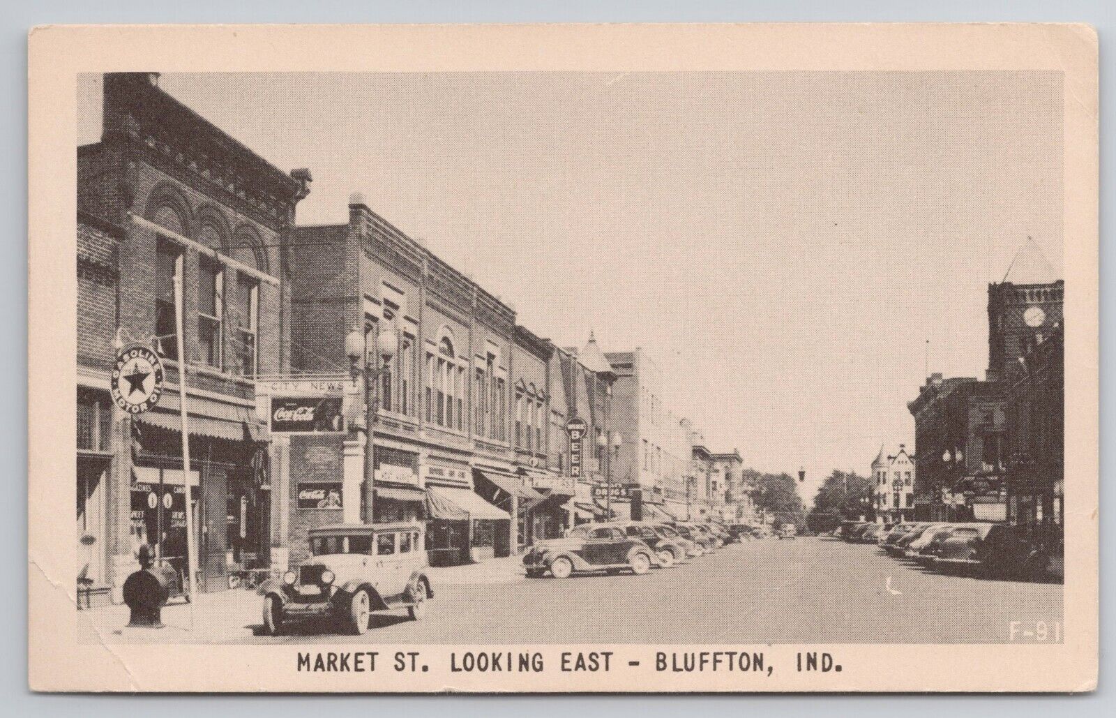 c1930s-40s Postcard Market St Looking East Bluffton IN  Coca Cola Sign Cars