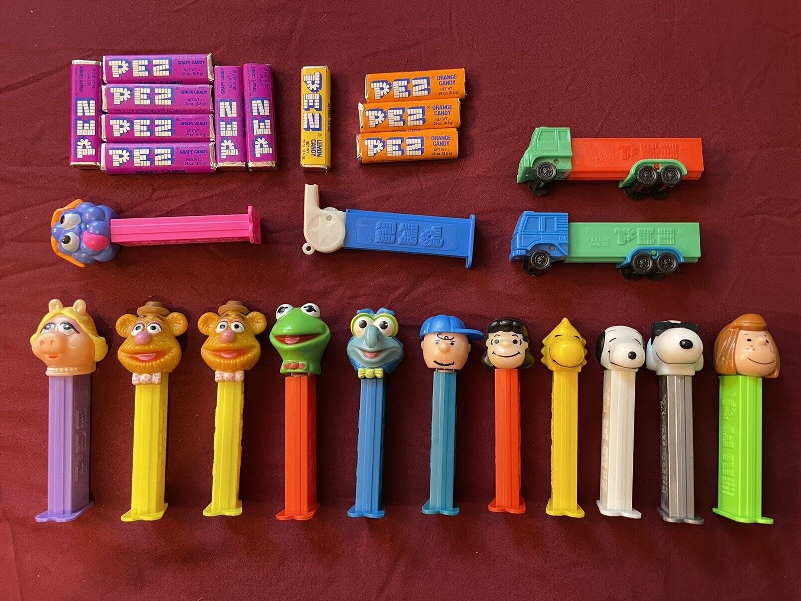 Pez Dispensers Lot of 15 Muppets and Charlie Brown Peanuts Truck Candy