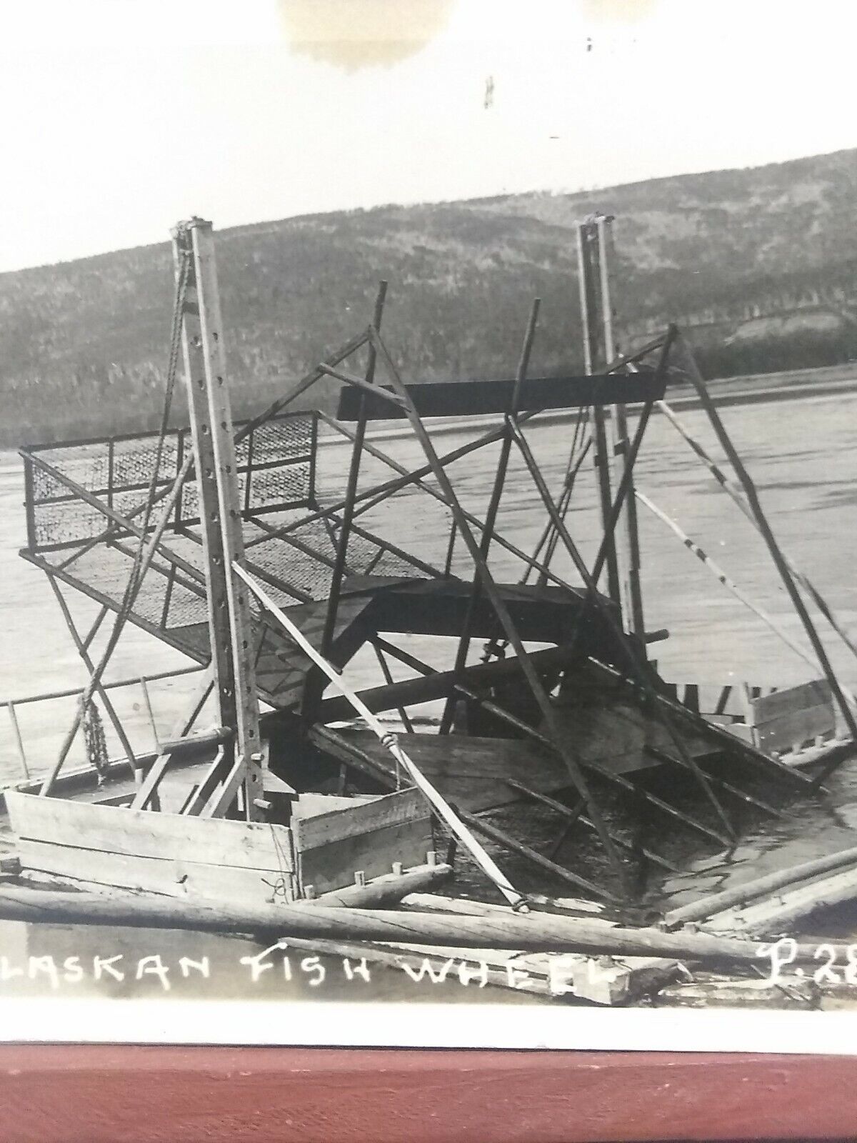 Vintage RPPC. Alaskan fish wheel (salmon wheel) Alaska.