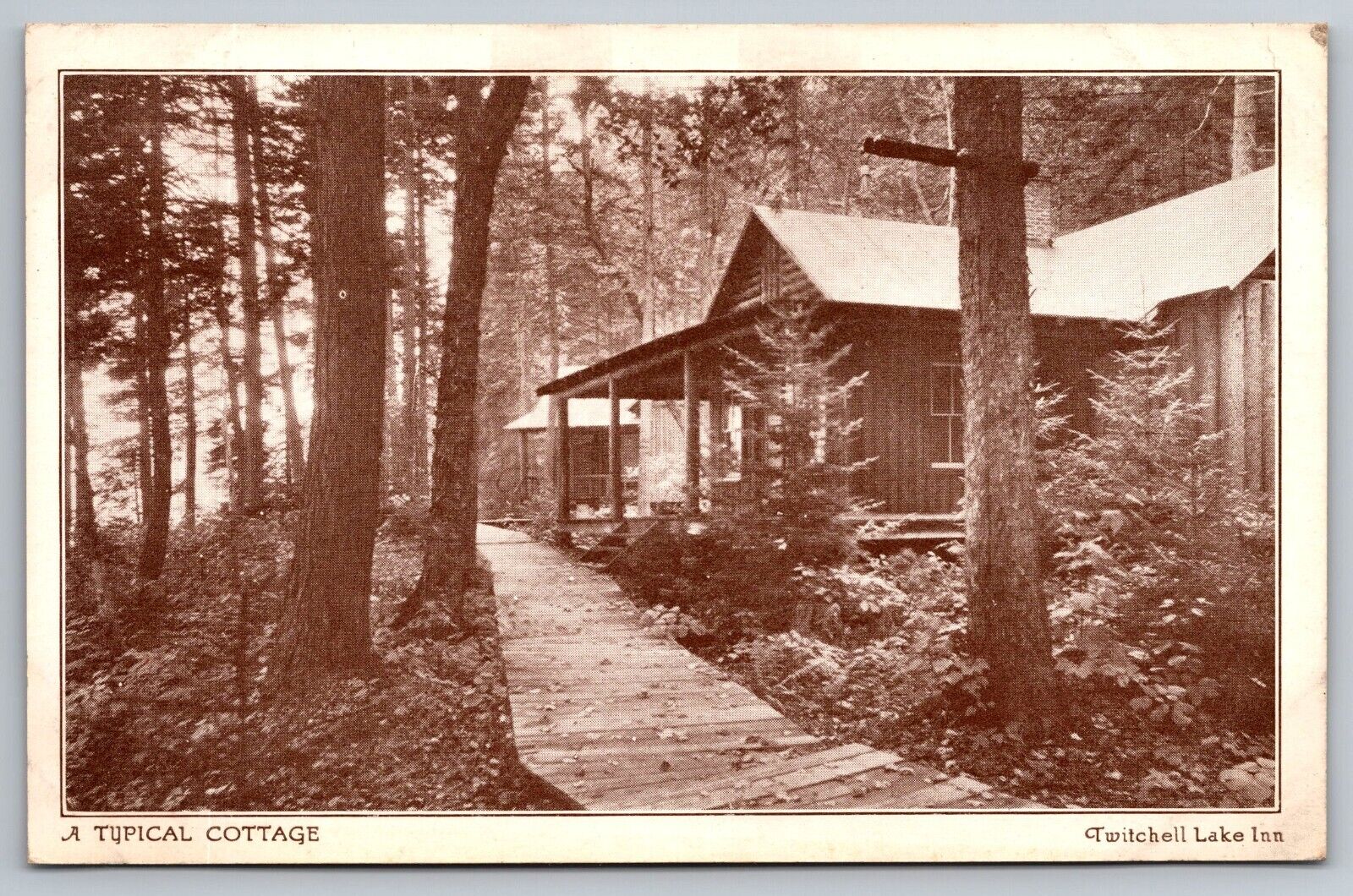 Typical Cottage. Twitchell Lake Inn. Big Moose New York Vintage Postcard