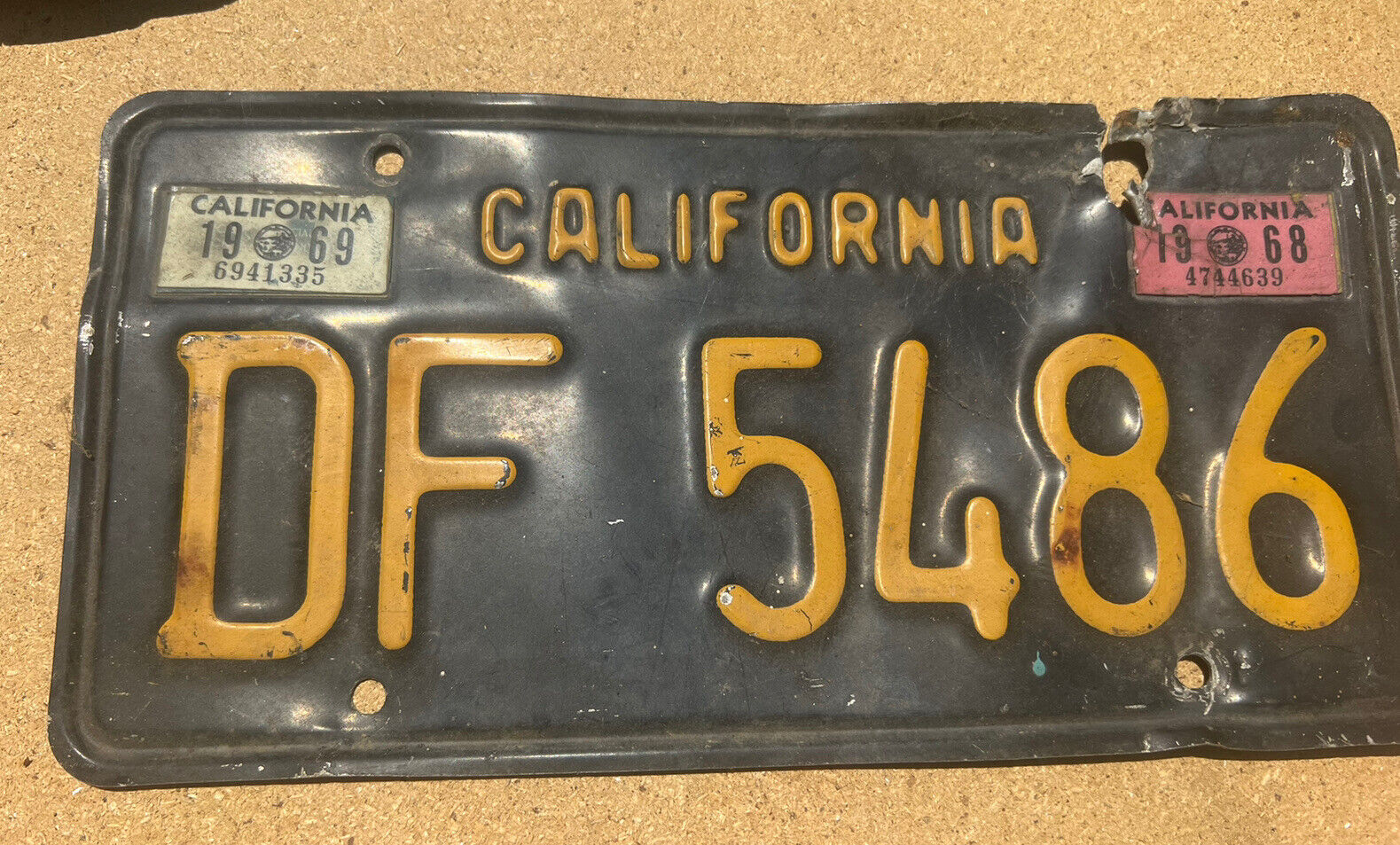 Vintage CALIFORNIA BLACK AND YELLOW LICENSE PLATE WITH '68 & '69 STICKERS
