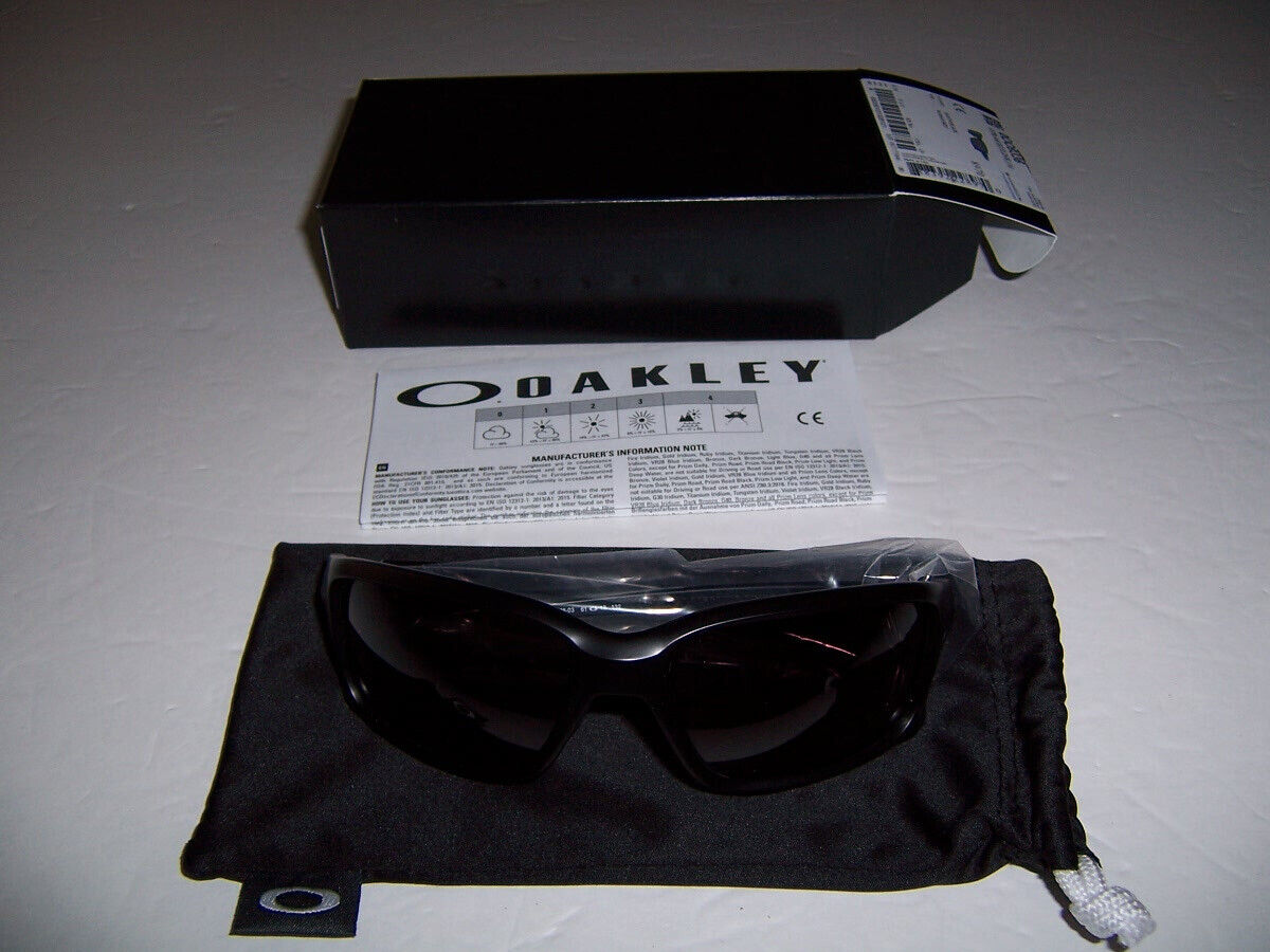 Brand New Oakley Sunglasses - 8970 - Matte Black Warm Grey