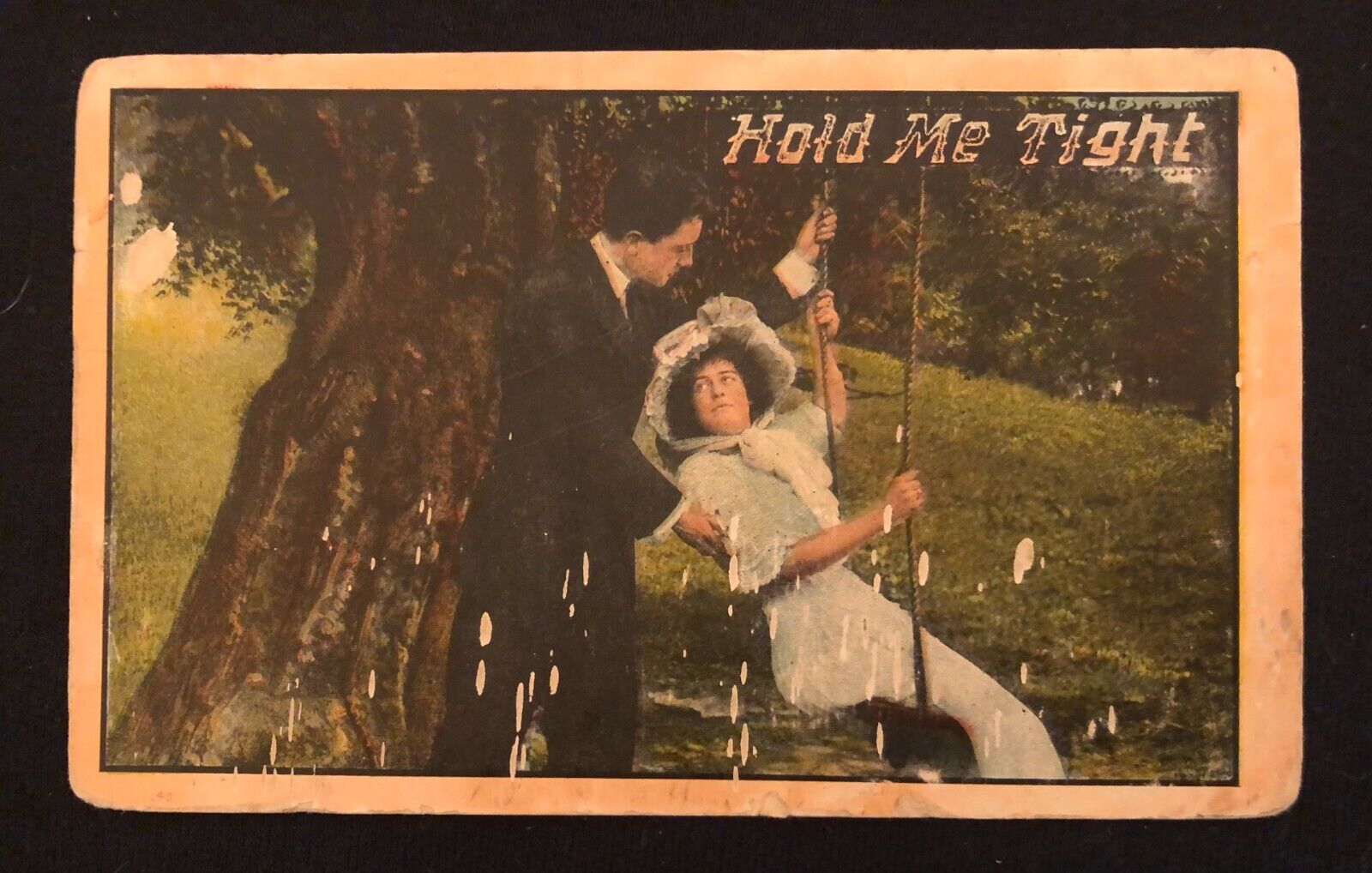 1912 Man pushing Woman on Swing \