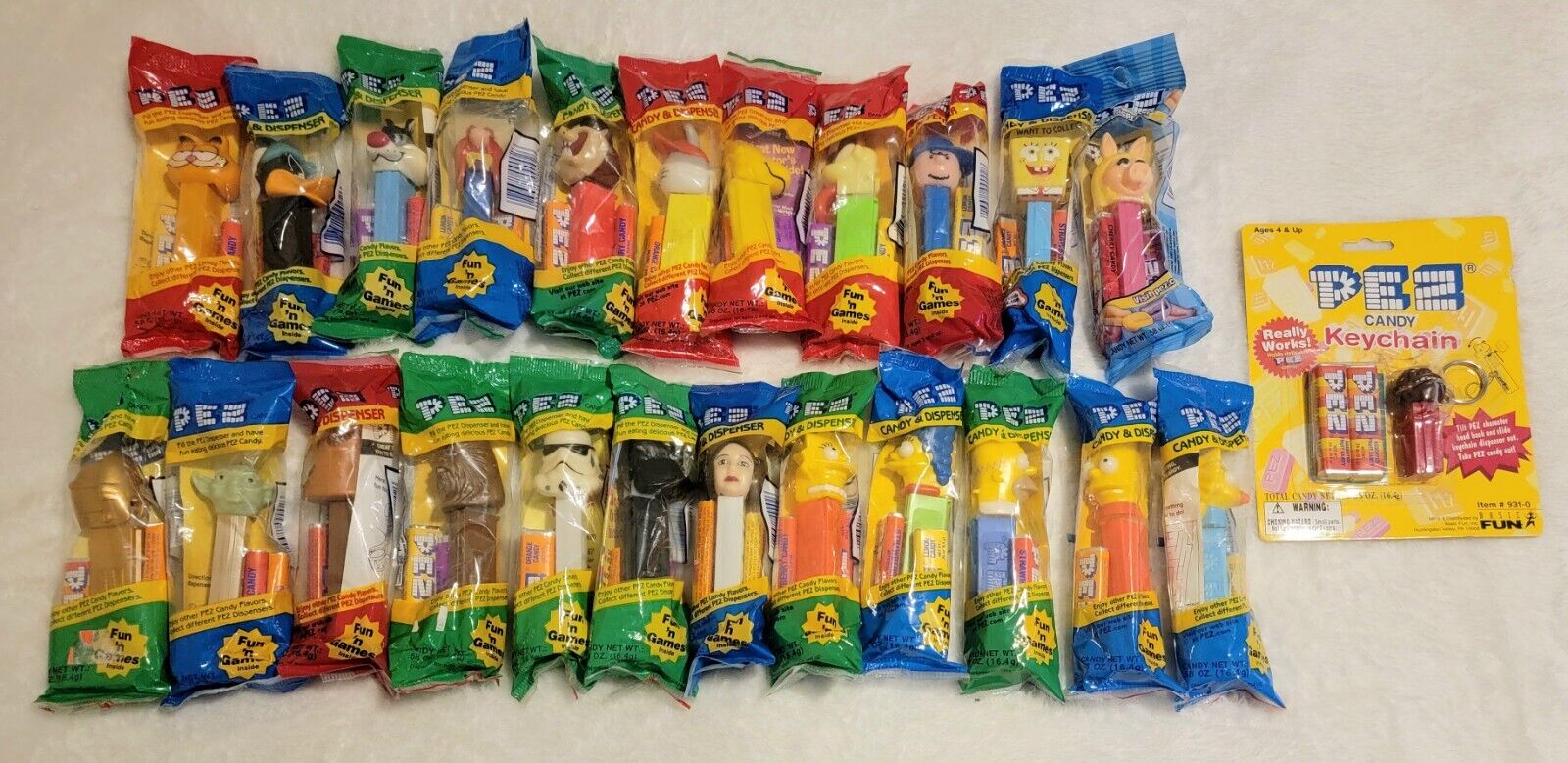 Vintage Pez Dispensers Lot of 24 Unopened Mixed Lot-includes 1  Vintage Keychain