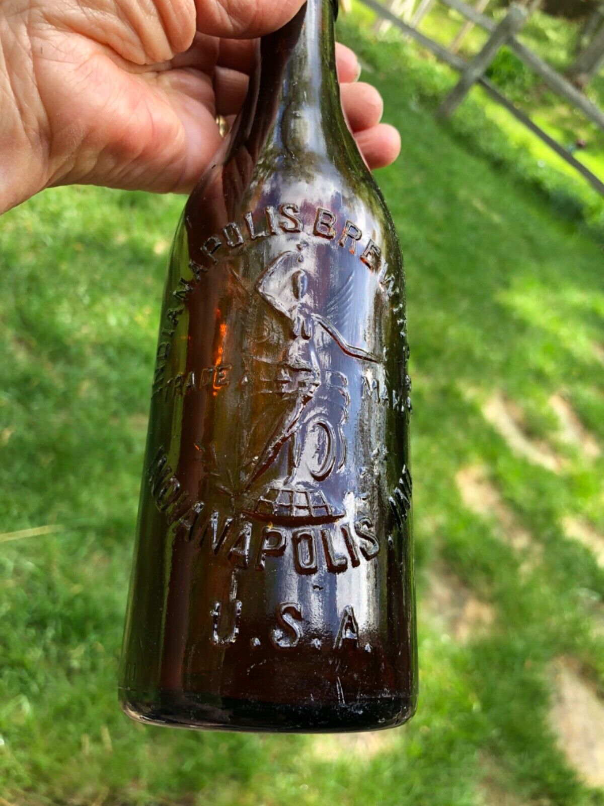 Indianapolis Brewing Co Brown Bottle Winged Lady Nymph Heavily Embossed