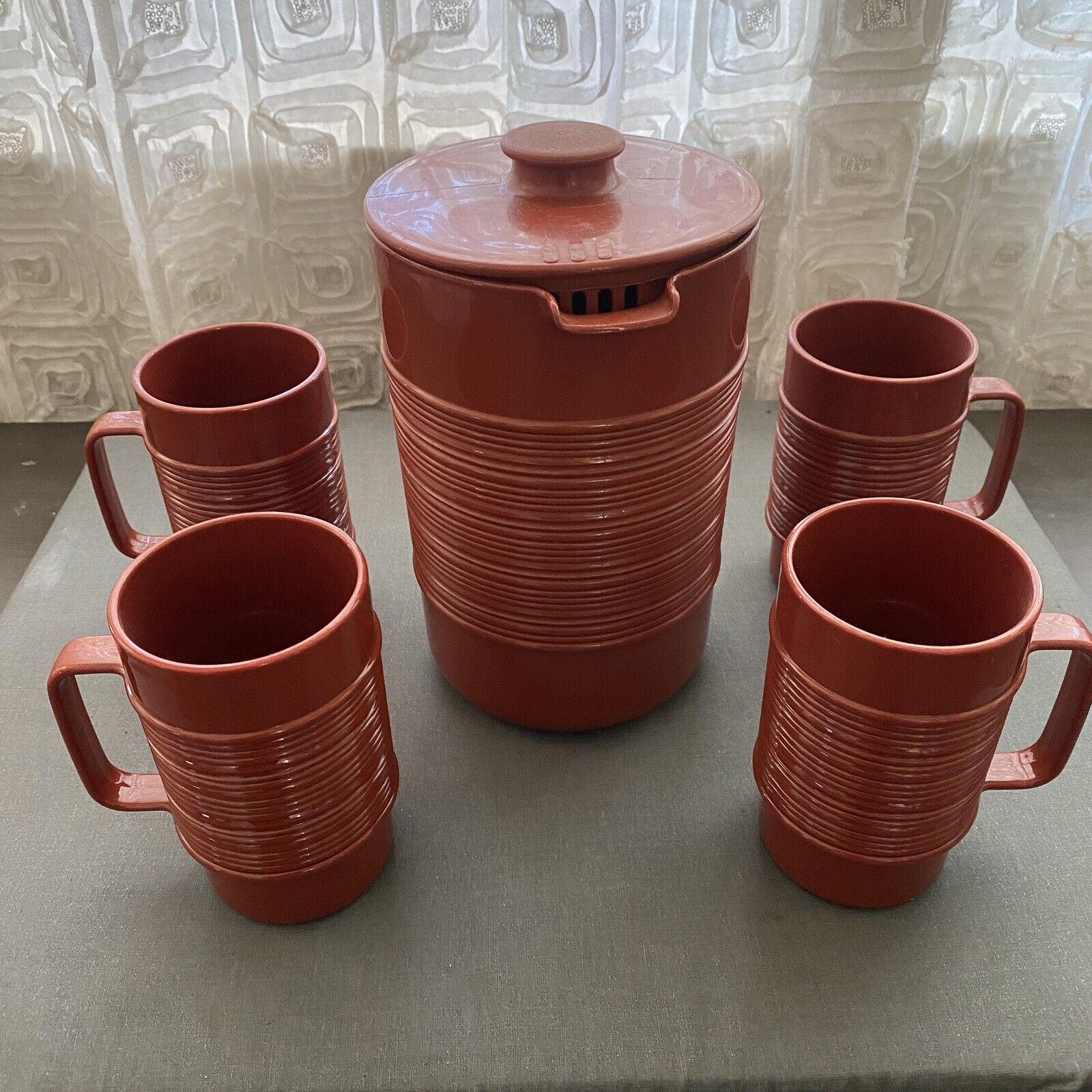 Vintage Rubbermaid Ribbed Pitcher and Mug Set Rust Colored Plastic 2678 and 3829