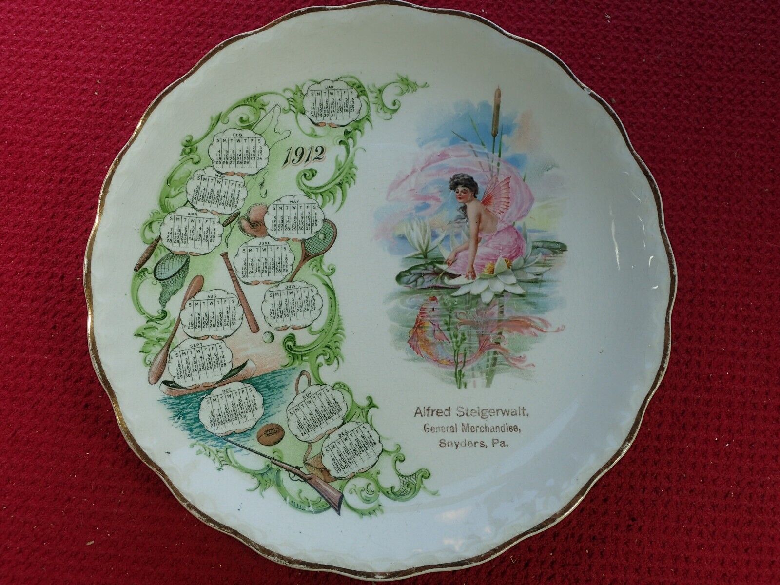1912 Advertising Calendar Plate with Fairy, Fish & Sports Theme Equipment