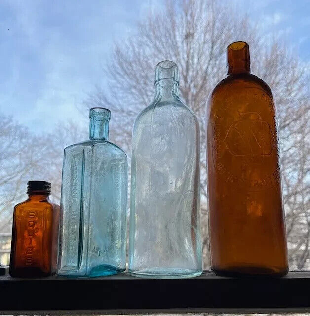 Antique Medicine & Bitters Bottles   (lot of 4)