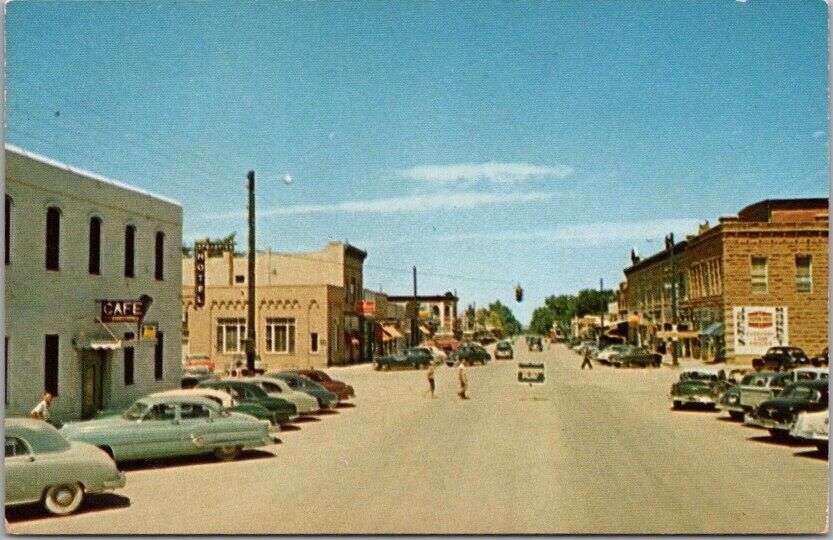 Spearfish, South Dakota Postcard MAIN STREET Downtown Scene / 1940s & 50s Cars