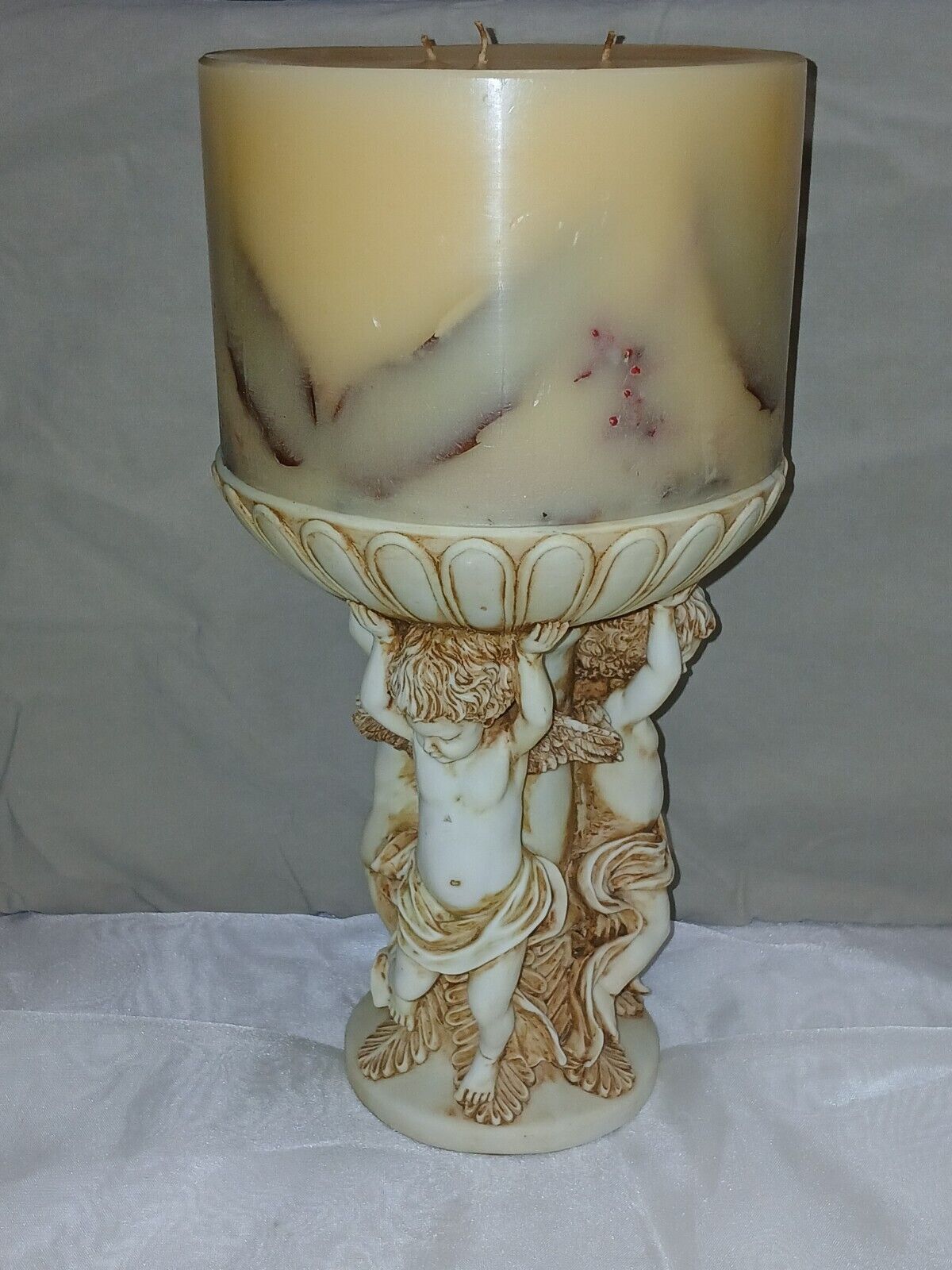 vintage cherub candle holder with candle