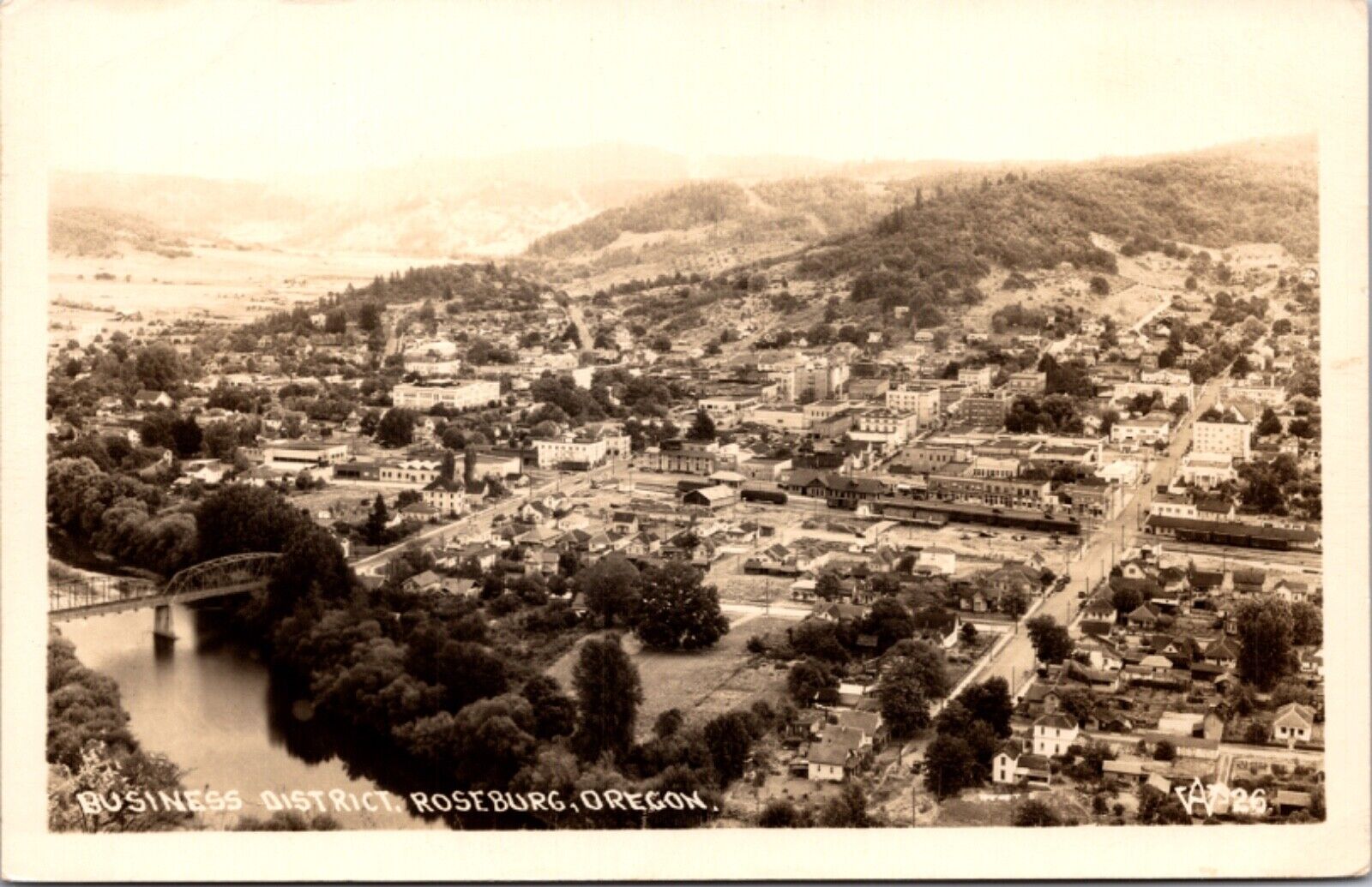 Real Photo Postcard Overview Business District in Roseburg, Oregon