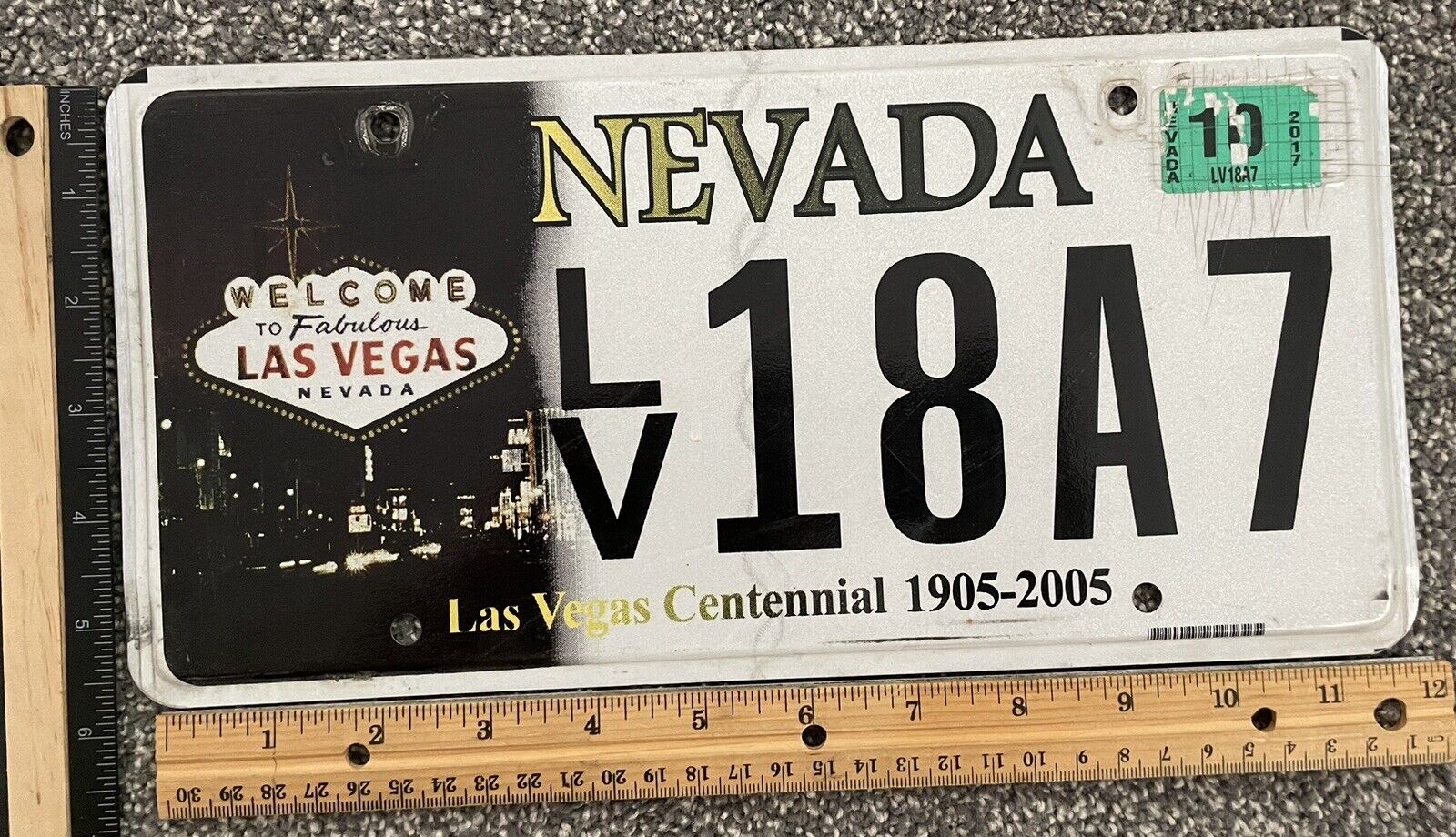 Las Vegas Nevada Centennial Flat Vehicle License Plate LV 18A7 Oct 2017 Sticker