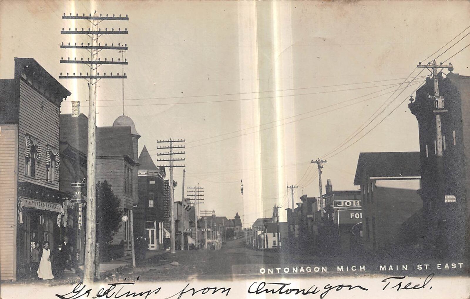 ONTONAGON Michigan postcard RPPC County Upper Peninsula Main Street stores 1906