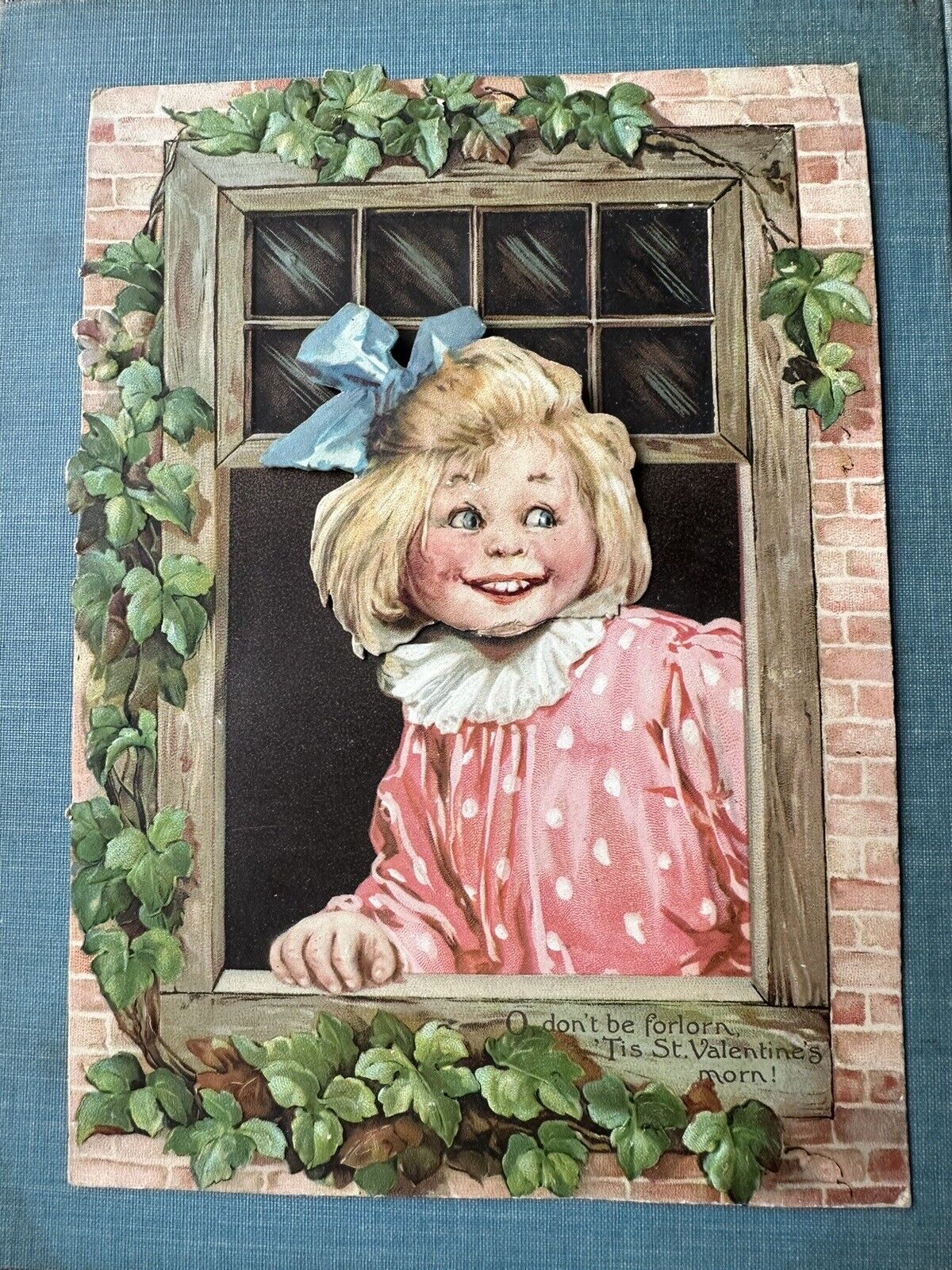 Antique 1920s Raphael Tuck and Sons mechanical girl in window Valentine