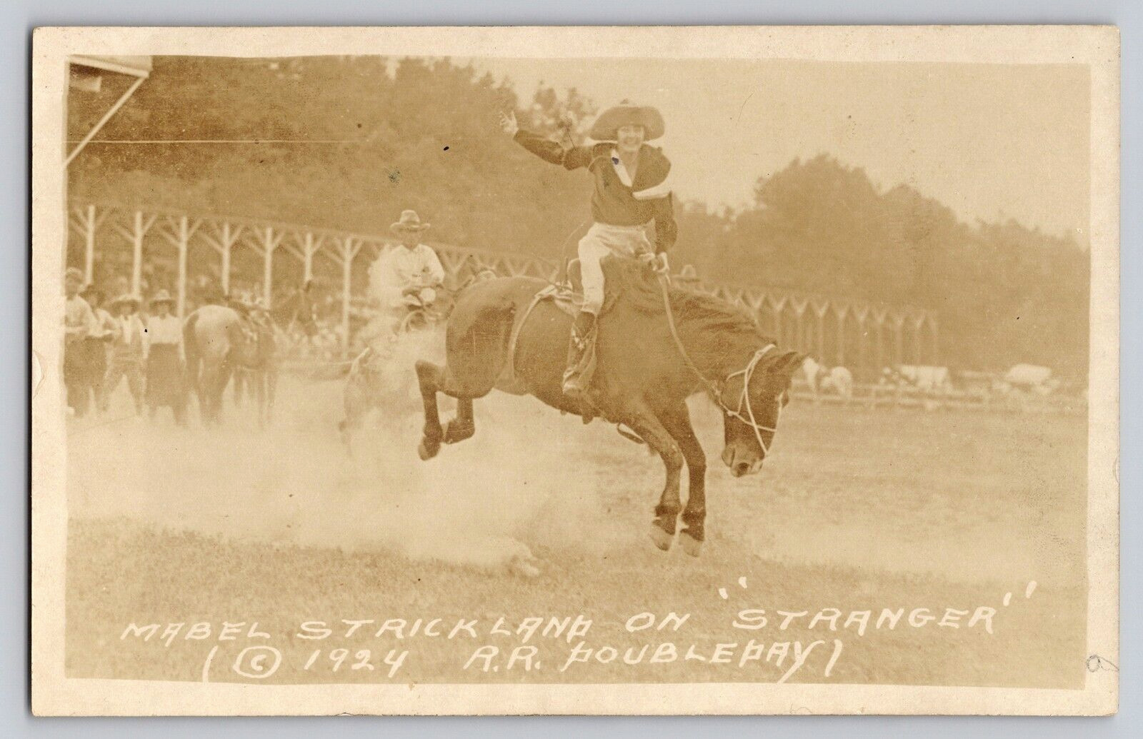 RPPC Photo Mabel Strickland Rodeo Cowgirl On Bucking Bronco Stranger Horse 1924