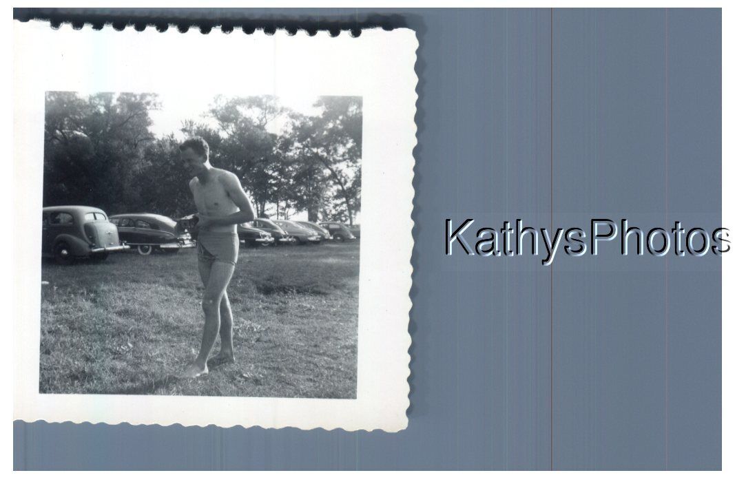 FOUND B&W PHOTO G_2786 BARE CHESTED MAN WALKING ON THE GRASS