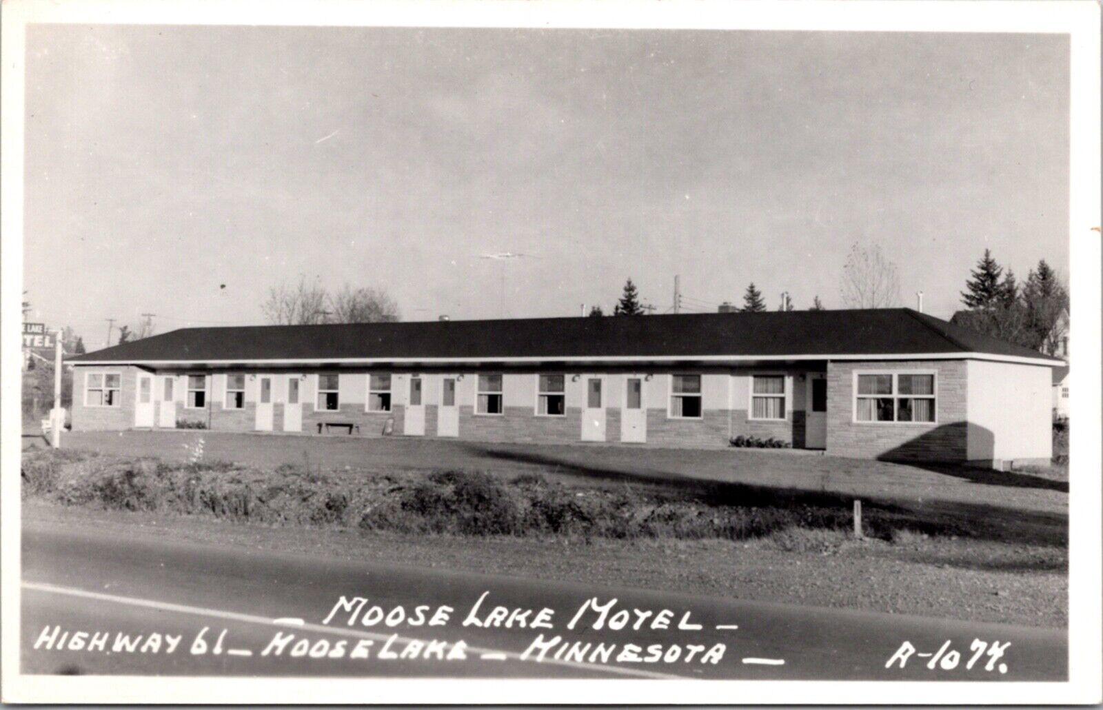 Real Photo Postcard Moose Lake Motel Highway 61 in Moose Lake, Minnesota
