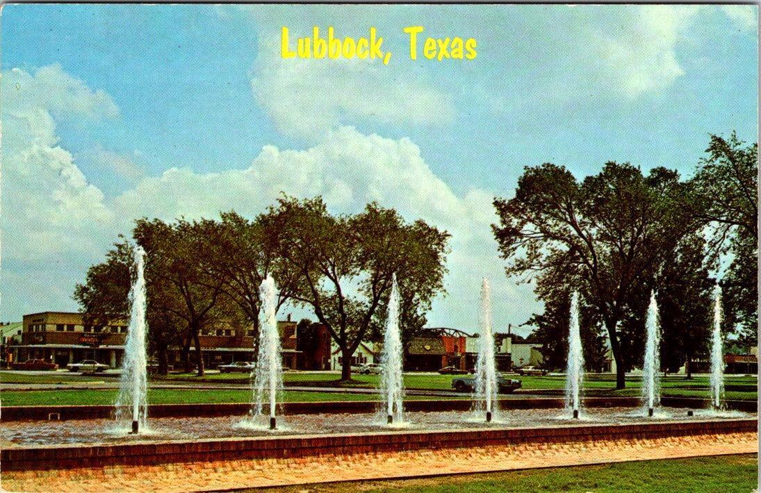 Lubbock, TX Texas  FOUNTAIN On TEXAS TECH CAMPUS  Street Scene Beyond  Postcard