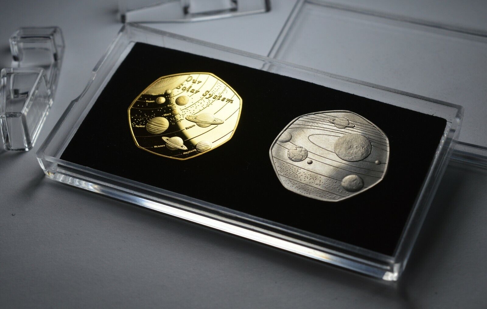 Pair of SOLAR SYSTEM Commemoratives in 50p Coin Display Case. Gold, Titanium 