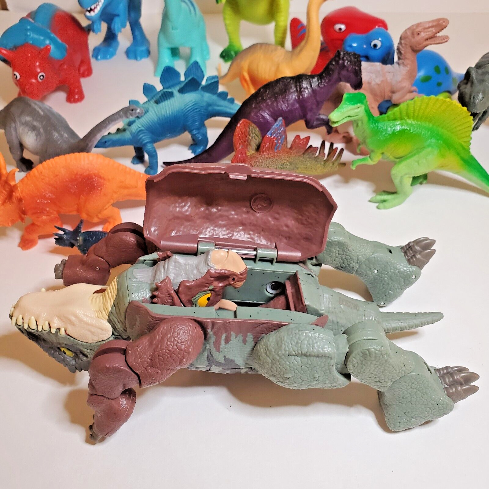 Mixed Lot of Dinosaur Toys - Transforming Jurassic World, Paw Patrol, Plastic