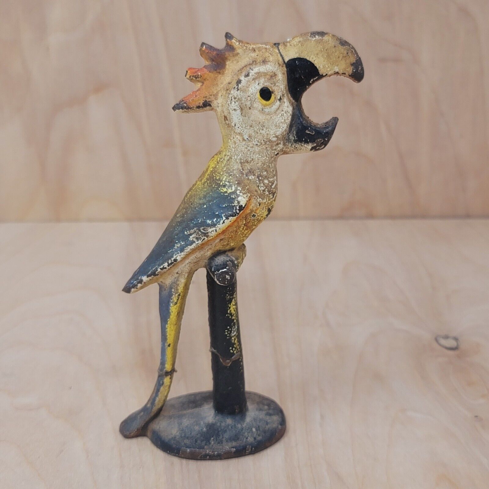 Antique Cast Iron Painted Figural Bottle Opener Parrot Perched on Stand