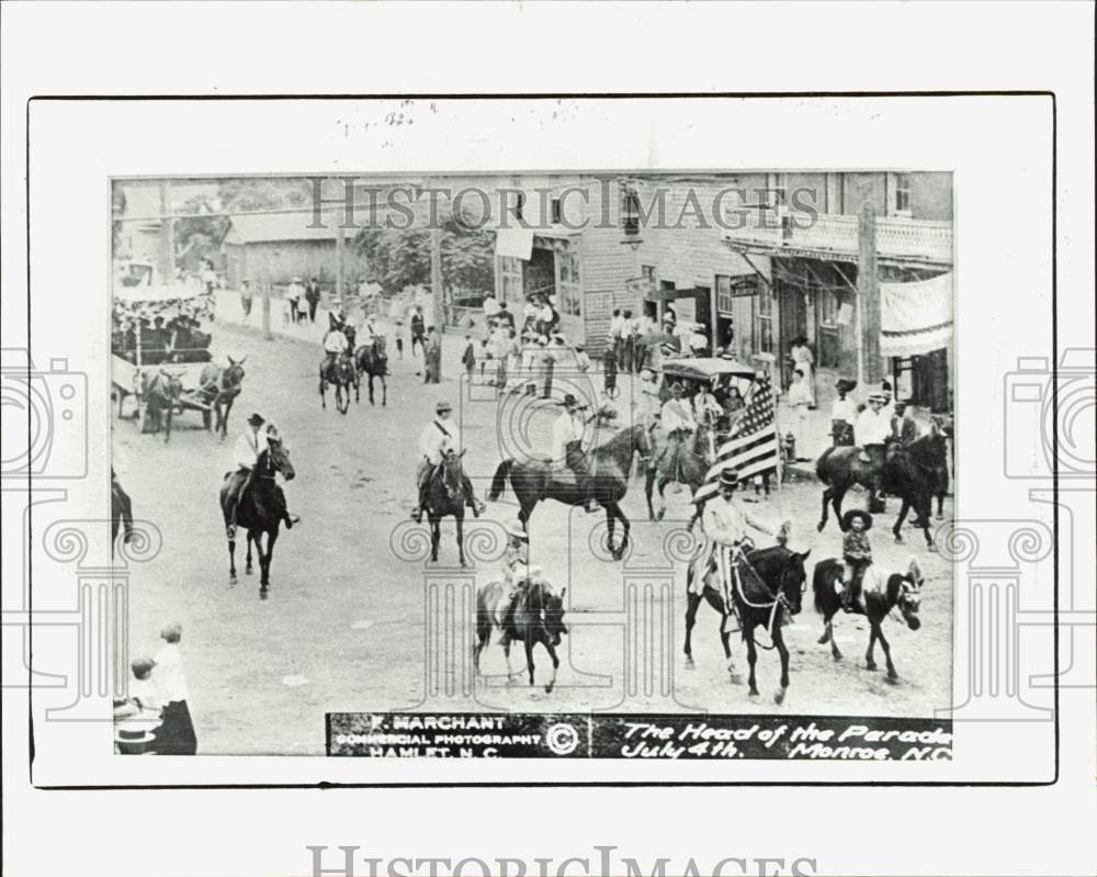 1909 Press Photo Horses ride in 4th of July parade in Monroe, North Carolina.