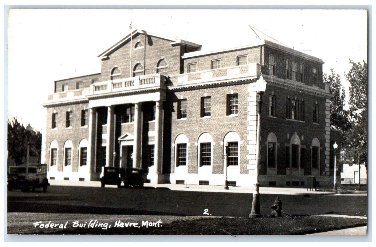 1941 Federal Building Cars Street Scene Havre Montana MT RPPC Photo Postcard
