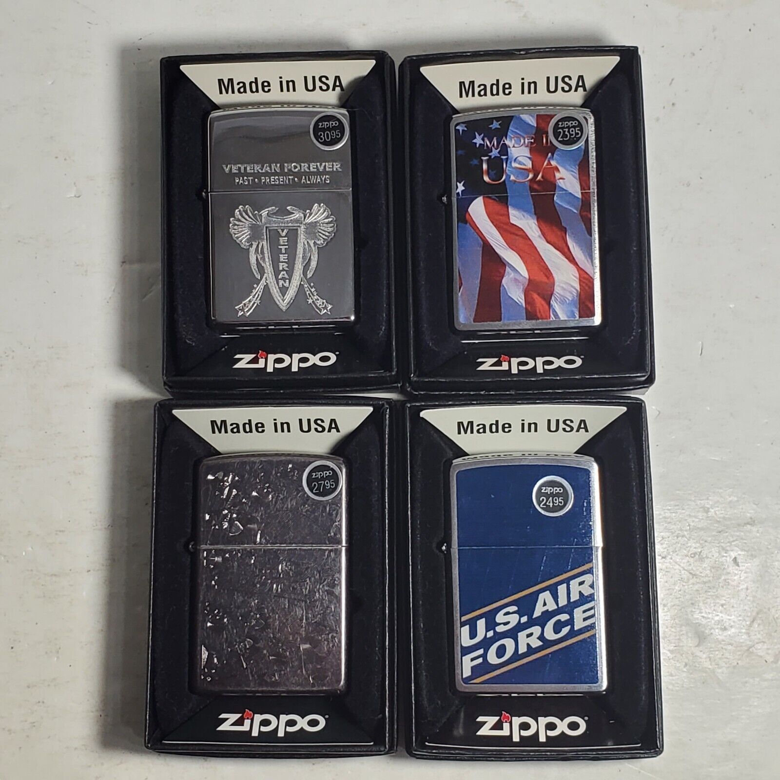 LOT OF 4 ZIPPO LIGHTERS  MADE IN U.S.A. IN BOX UNUSED 