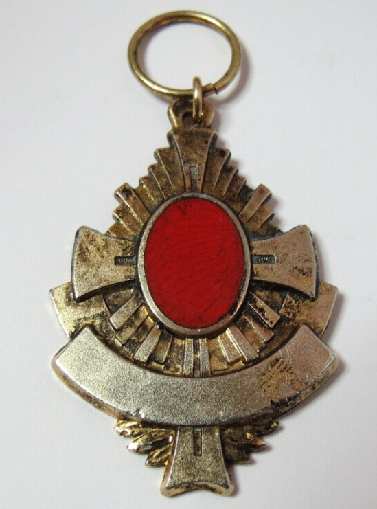ANTIQUE MEDAL BLACKINTON WITH RED STONE FOB PENDANT