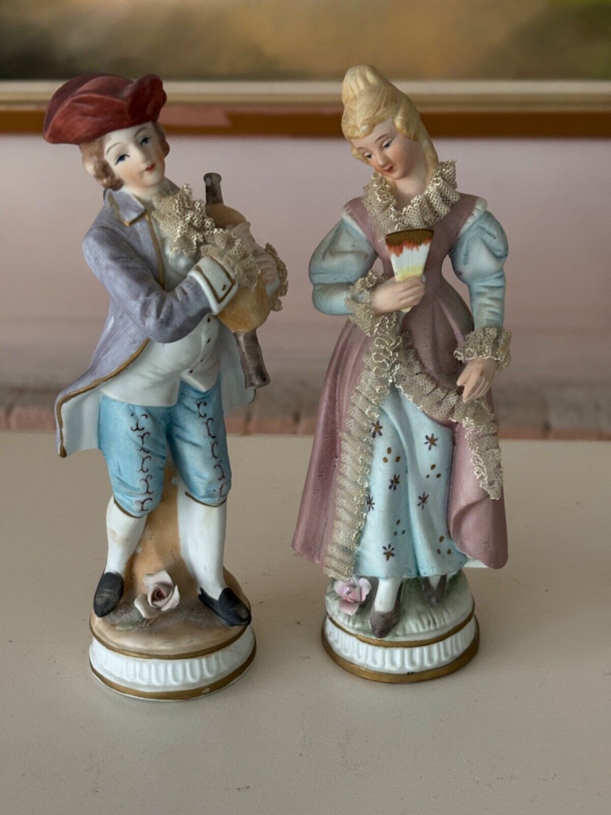 pair of Norleans bisque and lace figurine