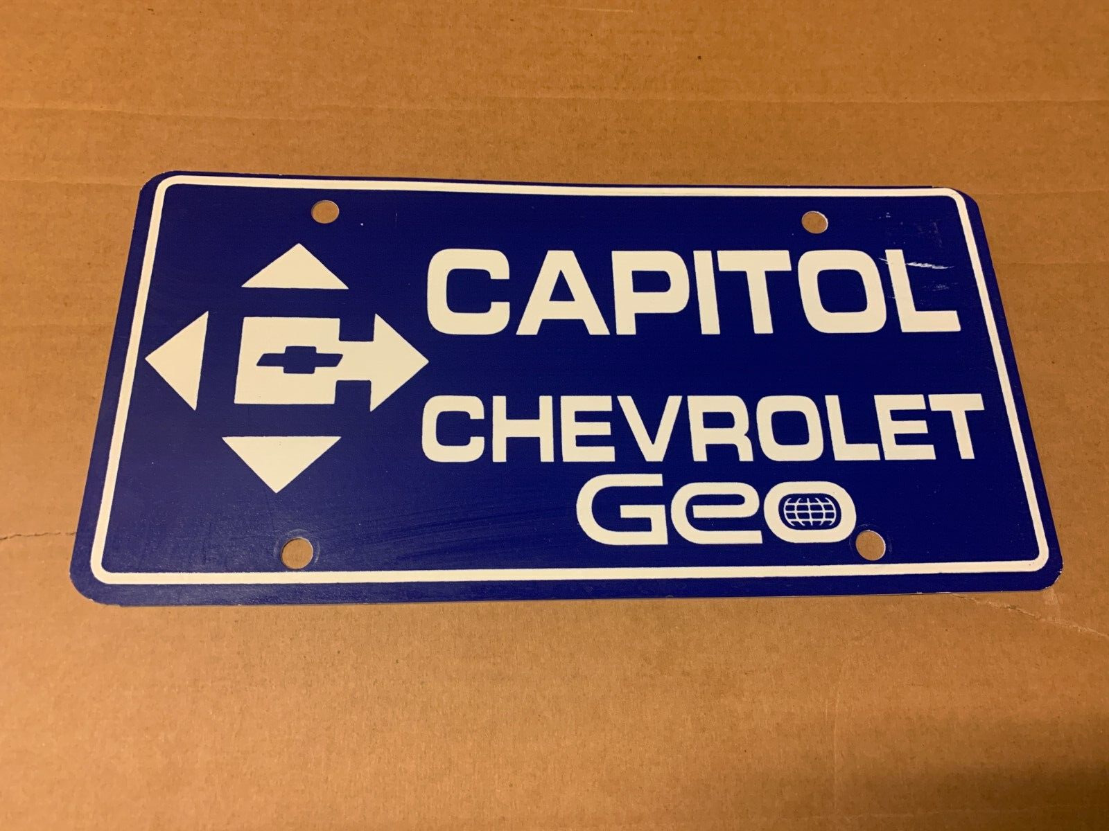 Capitol Chevrolet Geo Georgetown Tx. Automobile Dealership Booster License Plate