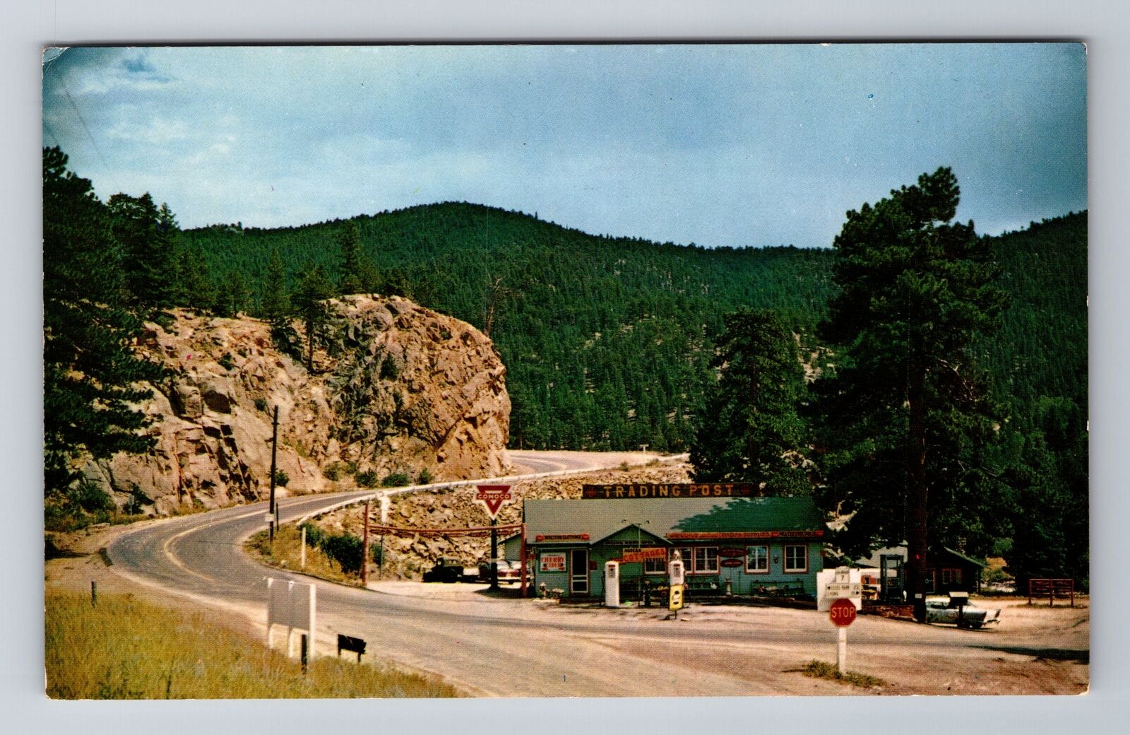 Lyons CO-Colorado, Wagon Wheel Trading Post, Conoco Gas Pumps, Vintage Postcard