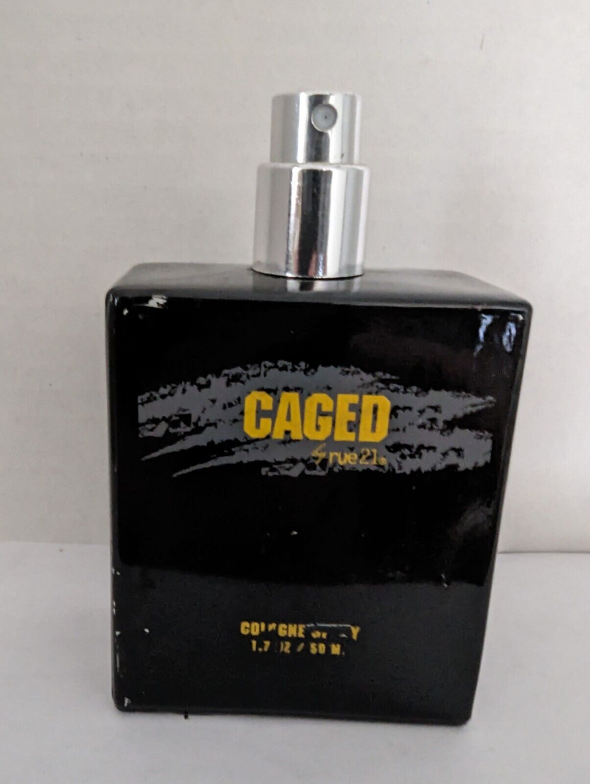 Caged Cologne Rue21 Spray Bottle 1.7 oz/ 50ml Approx 50 % full