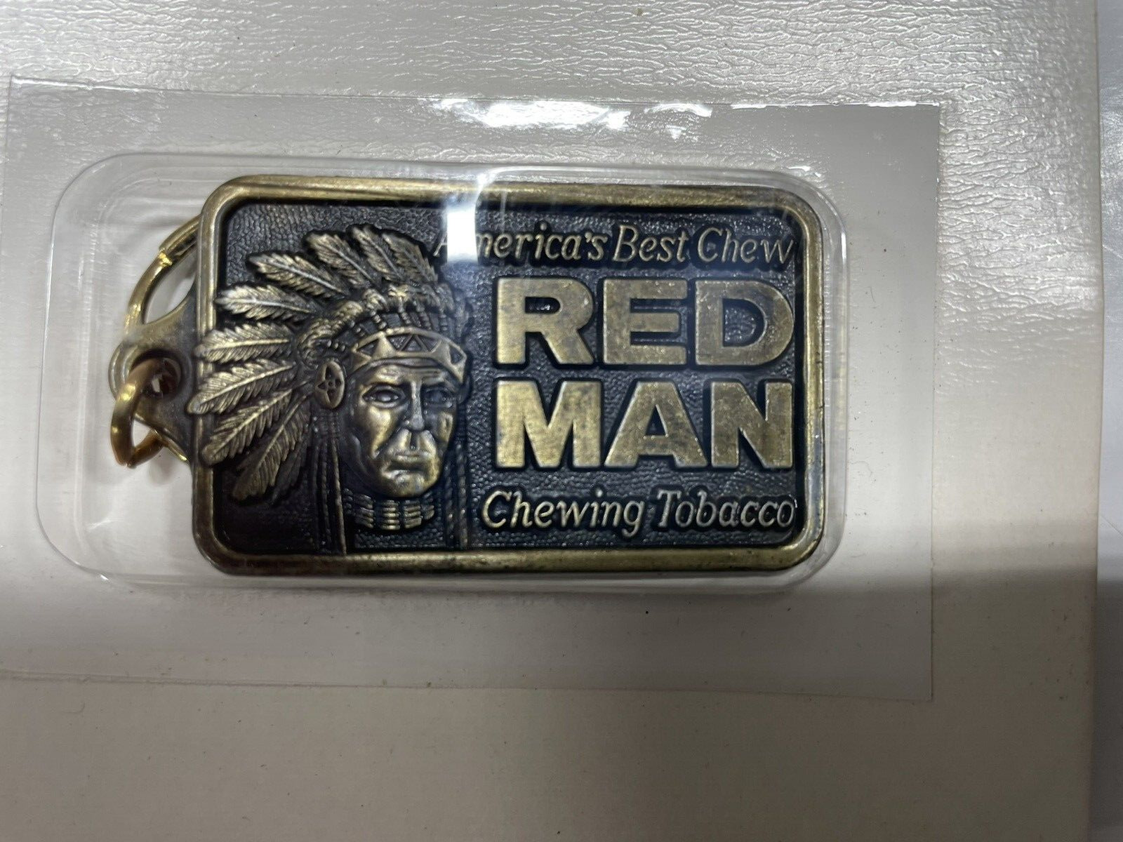 Vintage 1988 Red Man Logo Metal Key Chain NOS