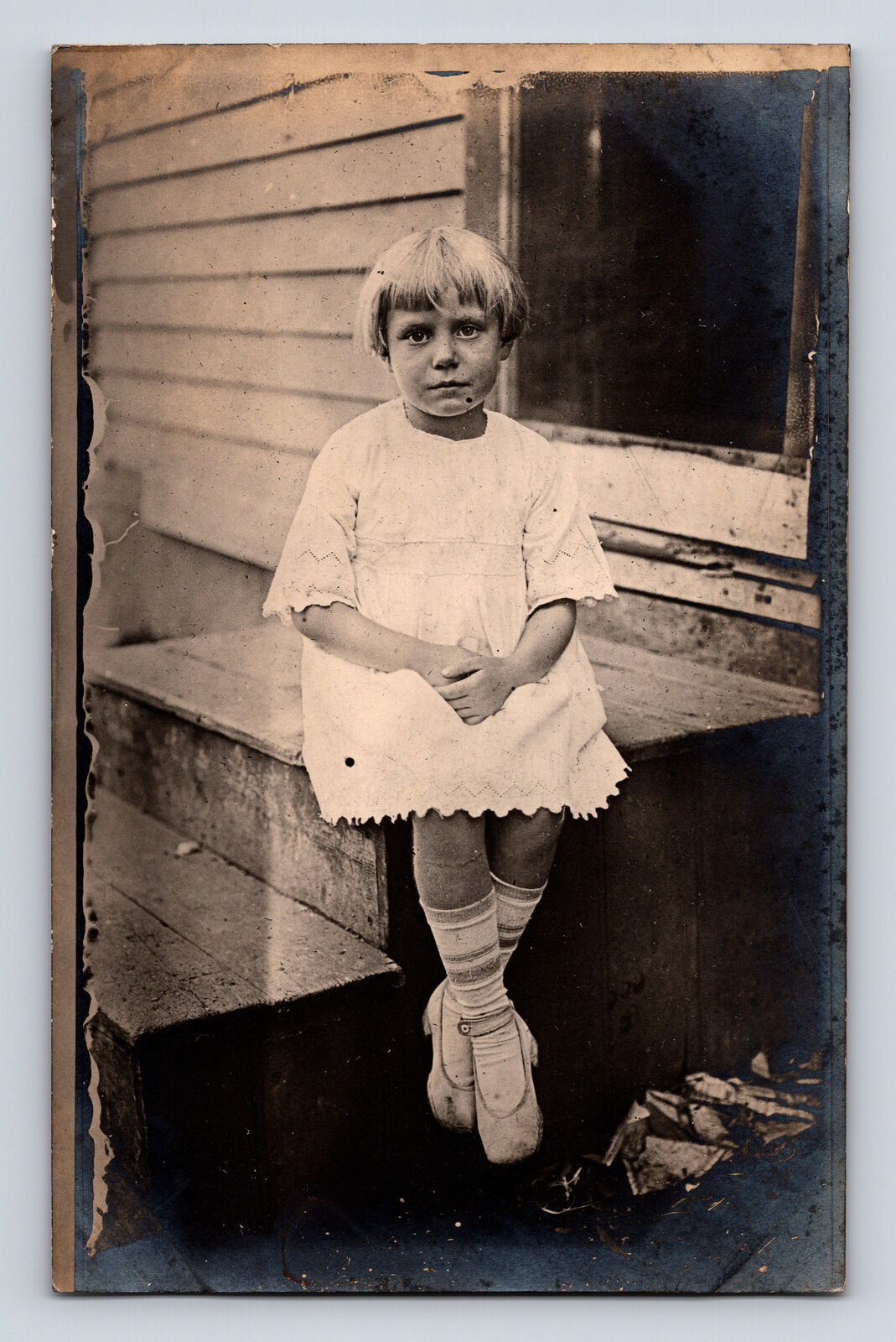 RPPC Outdoor Portrait of Young Girl on Stoop Porch Short Hairstyle Postcard